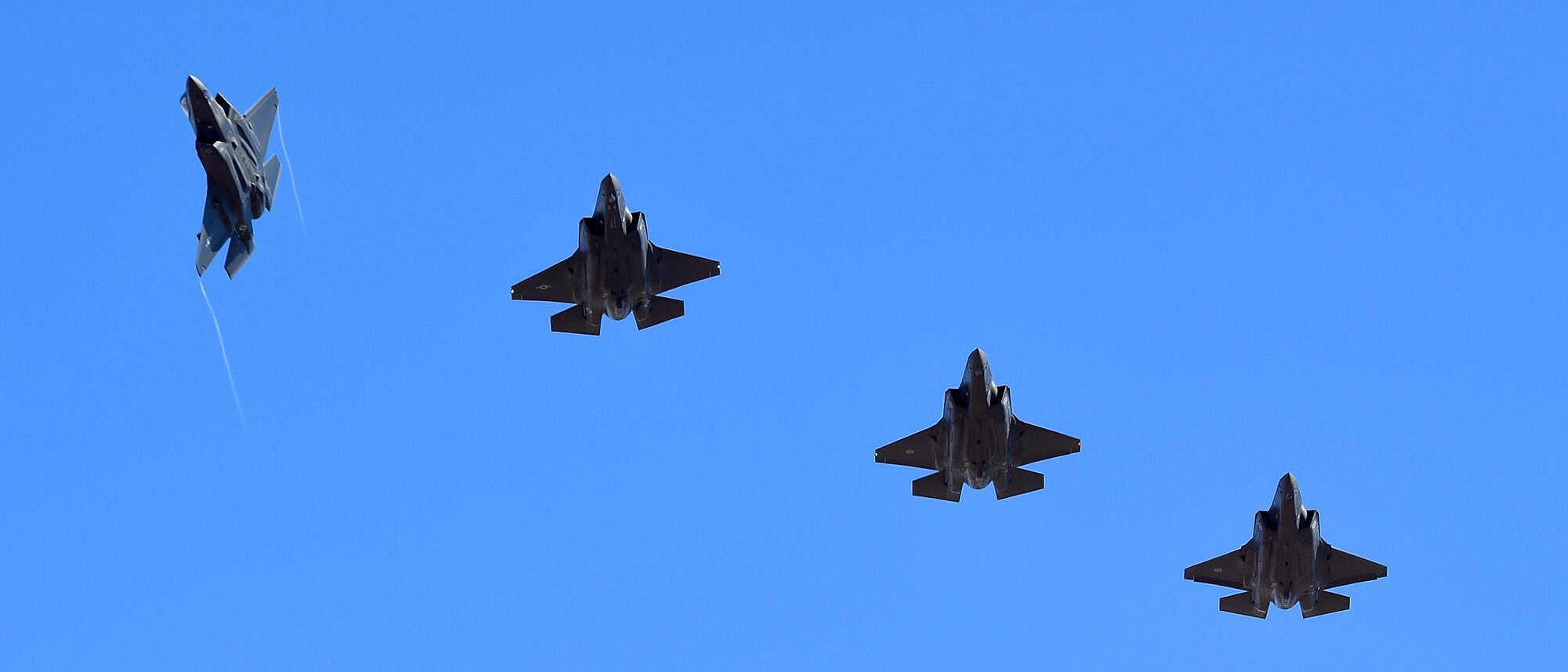 A formation of U.S. and Norwegian F-35 Lightning II soar over Luke Air Force Base, Arizona November 10, 2015. Today was the scheduled arrival of two F-35s for the Royal Norwegian air force while simultaneously celebrating the Norwegian air force’s birthday. (U.S. Air Force photo by Staff Sgt. Marcy Copeland)