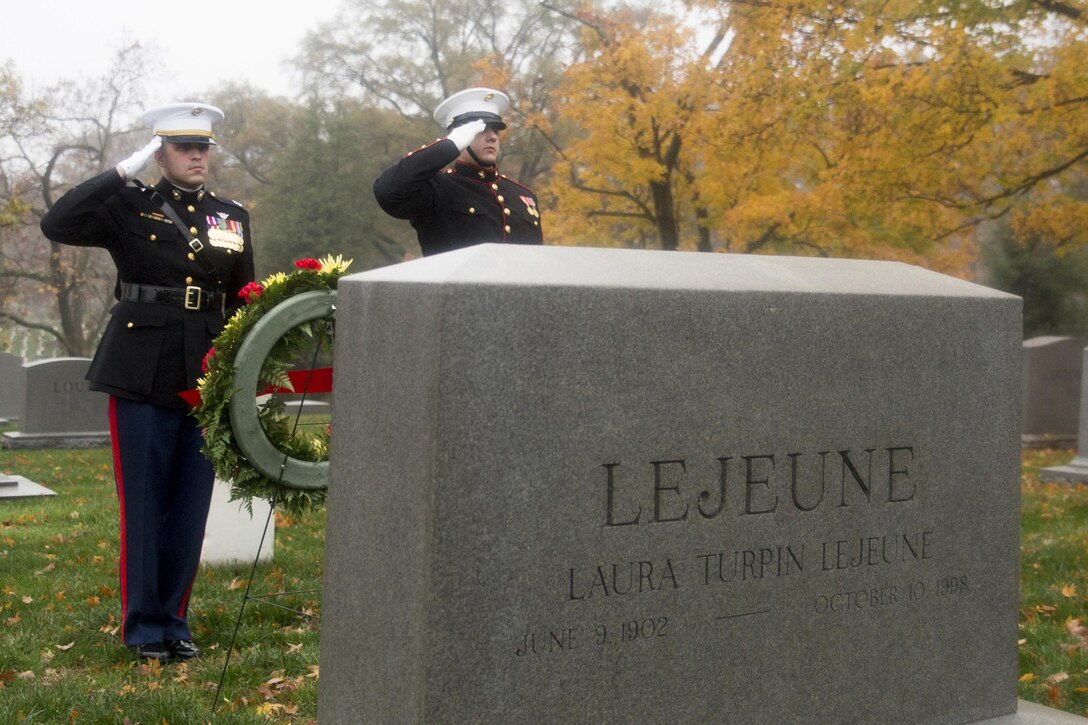 Capt. Benjamin Grodi and Lance Cpl. Anthony Huffman, Marines from Marine Barracks Washington D.C., salute as the bugler, Cpl. Ramiro DeLeon, plays 'Taps' during the wreath laying ceremony at the gravesite of former commandant, Gen. John A. Lejeune, Arlington National Cemetery, Va., Nov. 10, 2015. In addition, a wreath laying ceremony was also conducted at the Marine Corps War Memorial in honor of all Marines past and present on the Marine Corps’ 240th birthday. (Official U.S. Marine Corps Photos by Cpl. Chi Nguyen/Released)