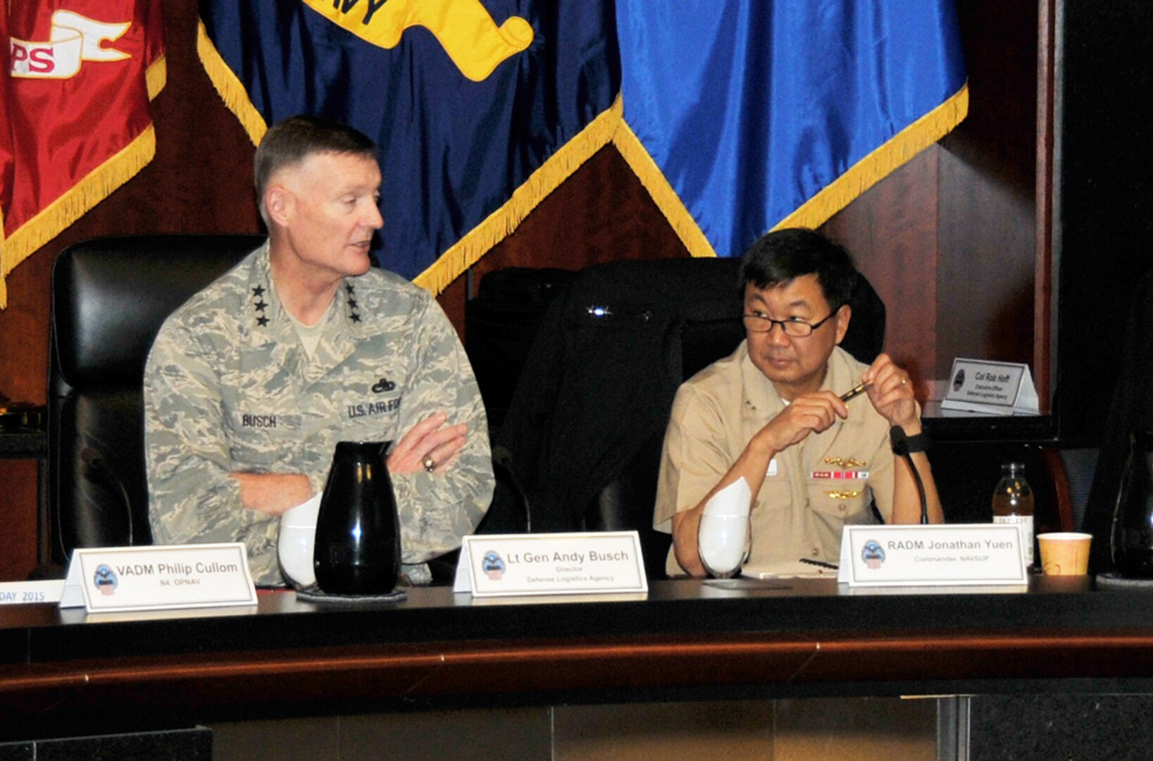 Defense Logistics Agency Director Air Force Lt. Gen. Andy Busch and Navy Rear Adm. Jonathan Yuen, commander of Naval Supply Systems Command, discuss the way forward during Navy/DLA Day Nov. 2 at the McNamara Headquarters Complex.