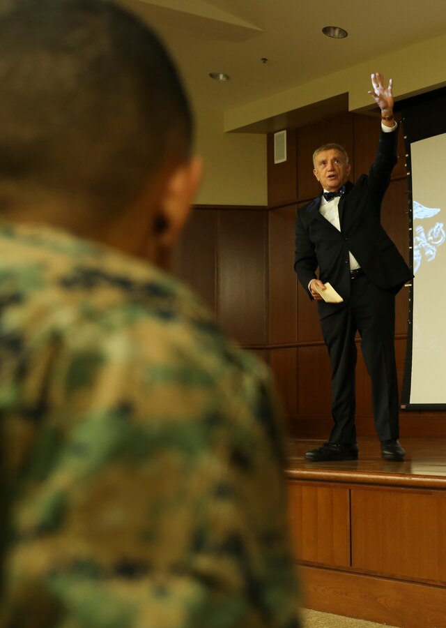 Patrick T. Brent, Marine veteran, journalist, businessman and historian, addresses an audience of Marines in the auditorium of Marine Corps Support Facility New Orleans, Nov. 12, 2015. Brent spoke to the Marines of Marine Forces Reserve about Marine Corps history and traditions and the impact those elements have on the Marine Corps today. Brent was also the guest of honor at the Marine Forces Reserve cake-cutting ceremony in honor of the Marine Corps’ 240th birthday, Nov. 10, 2015.