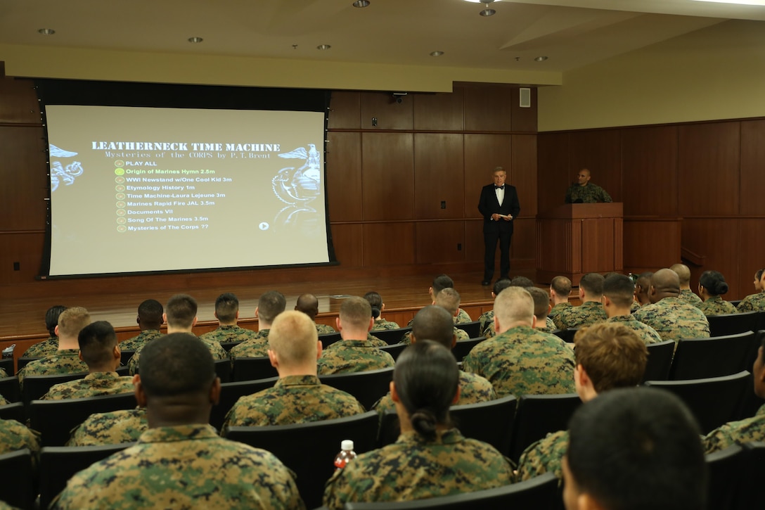 Patrick T. Brent, Marine veteran, journalist, businessman and historian, addresses an audience of Marines in the auditorium of Marine Corps Support Facility New Orleans, Nov. 12, 2015. Brent spoke to the Marines of Marine Forces Reserve about Marine Corps history and traditions and the impact those elements have on the Marine Corps today. Brent was also the guest of honor at the Marine Forces Reserve cake-cutting ceremony in honor of the Marine Corps’ 240th birthday, Nov. 10, 2015. (U.S. Marine Corps photo by Cpl. Tiffany Edwards)