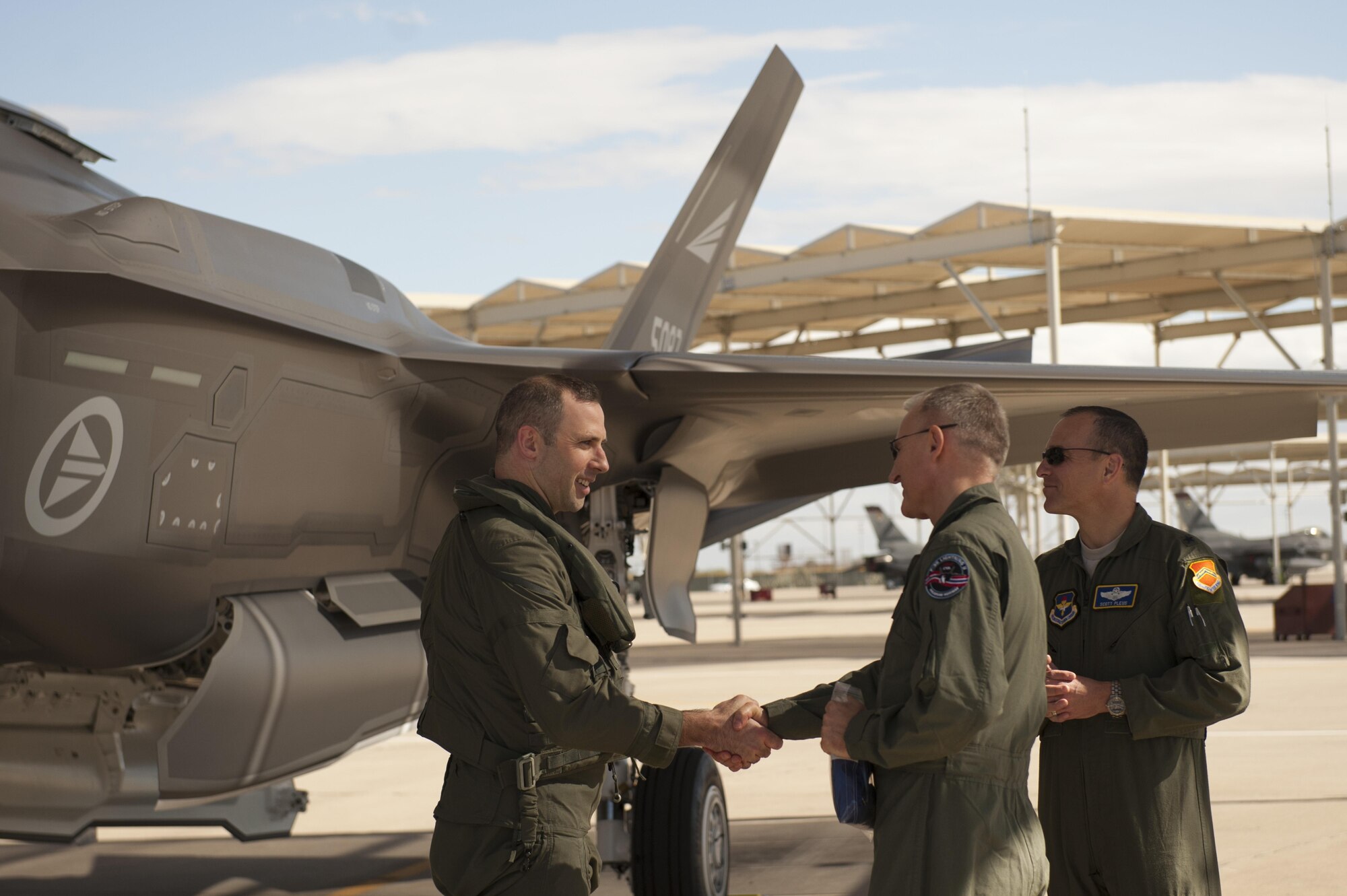 Maj. Gen. Morten Klever, the program director of the Norwegian F-35 program, accepts the first two Norwegian F-35 Lightning IIs after they arrived at Luke Air Force Base, Ariz., Nov. 10, 2015. Shortly after, a Norwegian pilot flew the F-35 for the first time, in conjunction with the Royal Norwegian Air Force’s birthday. (U.S. Air Force photo/Staff Sgt. Staci Miller)