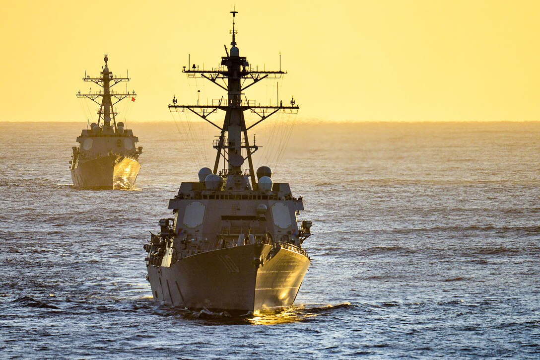 The USS Chung-Hoon and USS William P. Lawrence join a formation during a transit exercise in the Pacific Ocean, Nov. 11, 2015. U.S. Navy photo by Petty Officer 3rd Class Christopher Frost