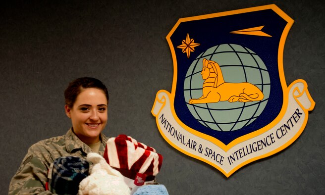 Senior Airman Rochelle Hansen, National Air and Space Intelligence Center accounts management technician, is on a mission to help three area Combined Federal Campaign organizations. She is collecting blankets for the St. Vincent De Paul Shelter, the Artemis Foundation and the Young Women’s Christian Association of Dayton. Hansen is assigned to NASIC located on Wright-Patterson Air Force Base, Ohio. (U.S. Air Force photo by Master Sgt. Tammie Moore)