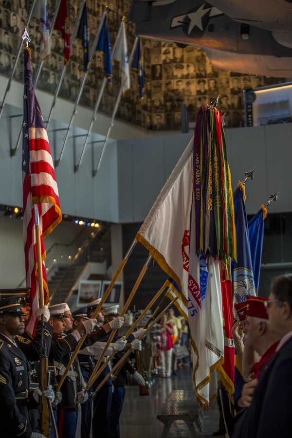 A joint color guard performs at the National World War II Museum in New Orleans during a Veterans Day Ceremony, Nov. 11, 2015. Service members and civilians took part in the ceremony to remember those who fought in battles past, and to recognize those who are fighting today. Each year on Veterans Day, the WWII Museum opens its doors to all veterans to explore the rich history of the past warriors who served in WWII. 