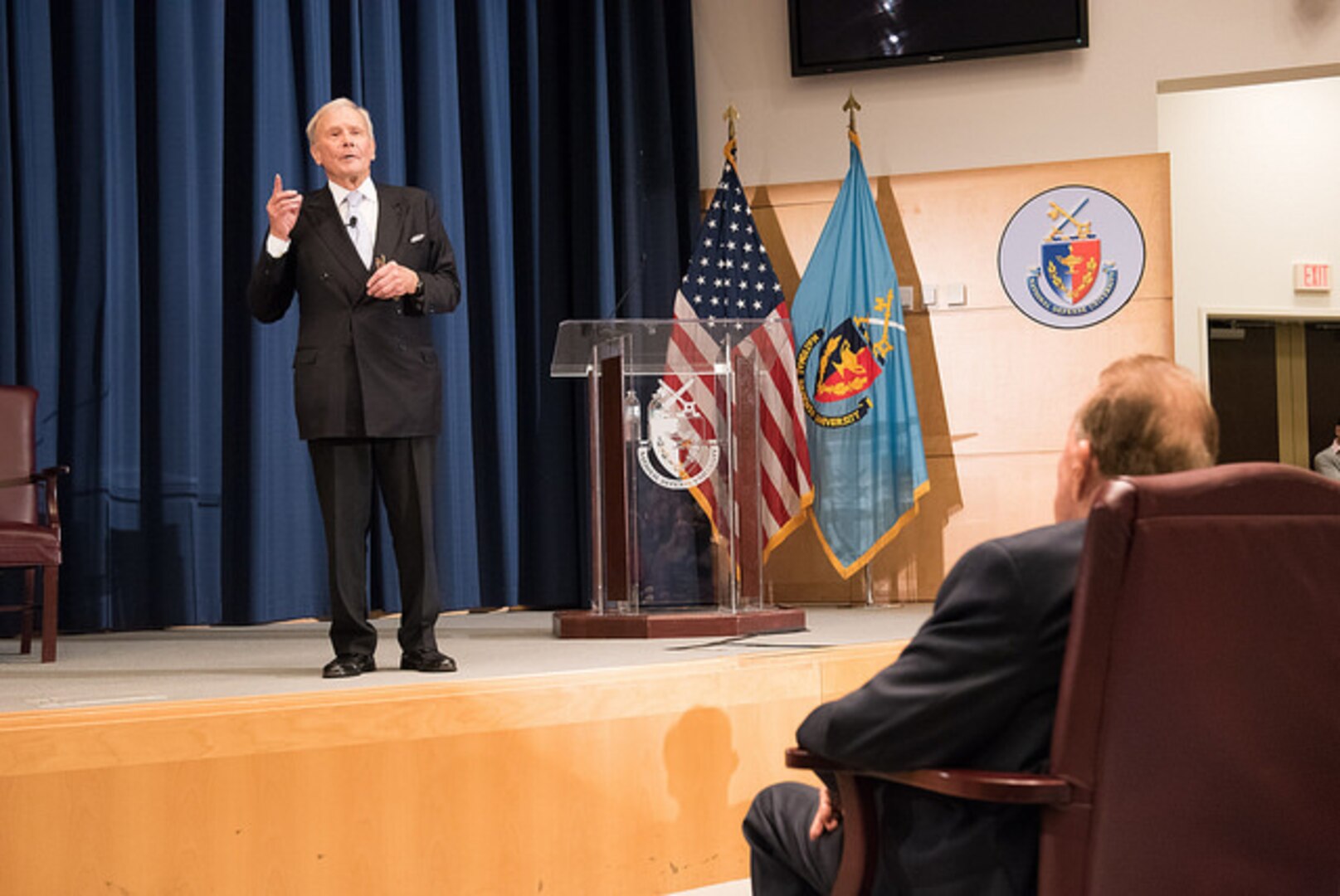 Tom Brokaw at NDU, Bob Dole looks on