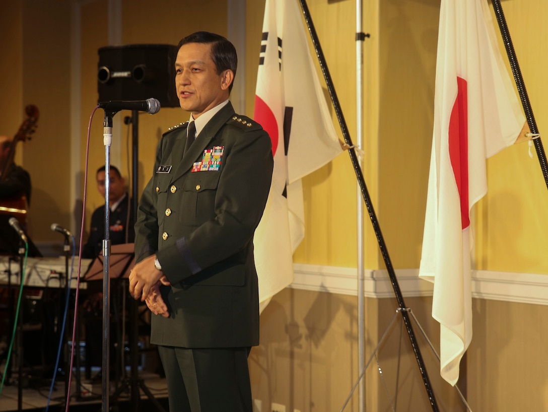 Japan Ground Self-Defense Force General Kiyofumi Iwata greets the bands from the U.S. Marine Corps, U.S. Navy, U.S. Air Force, U.S. Army and the Republic of Korea Navy at a reception Nov. 10 before the start of the JSDF Marching Band Festival in Tokyo, Japan. The festival is an opportunity for bands from different countries and cultures to perform together to increase bonds through sharing of music and military culture. Iwata is the Chief of Staff for the Japanese Ground Self-Defense Force.