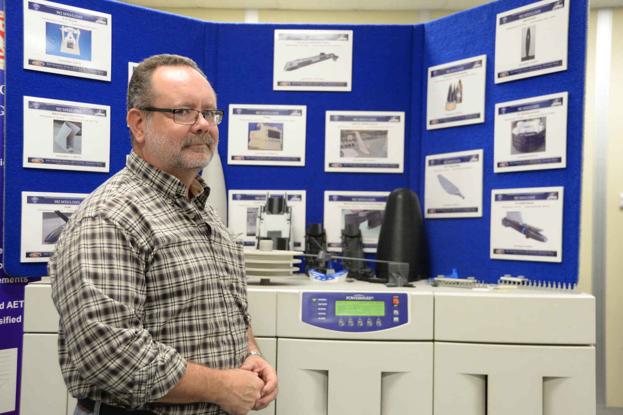 James Moore, 982nd Maintenance Squadron lead engineer tech, has been named the 2015 Air Education and Training Command Outstanding DOD Employee and Service Member with a disability Award Winner, his third MAJCOM award to date. (U.S. Air Force photo by Senior Airman Robert L. McIlrath)
