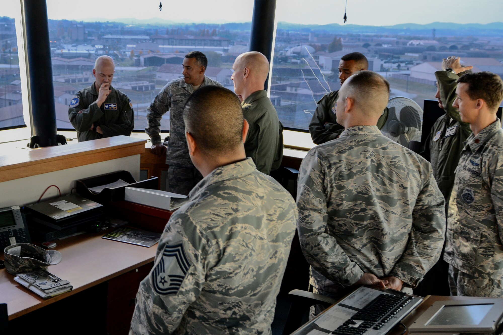 Maj. Gen. James N. Post III, Headquarters Air Force director of current operations and deputy chief of staff for operations, speaks with base senior leaders during a tour of the air traffic control tower at Osan Air Base, Republic of Korea, Nov. 12, 2015. Post visited Osan to discuss the challenges Airmen may face with training and readiness at the most forward, non-deployed air bases in the world. As the director of current operations, Post is in charge of providing time-sensitive situational awareness and analysis to Air Force senior leaders and linking worldwide operations with core Air Force processes to enable global vigilance, reach and power. (U.S. Air Force photo/Airman 1st Class Dillian Bamman)