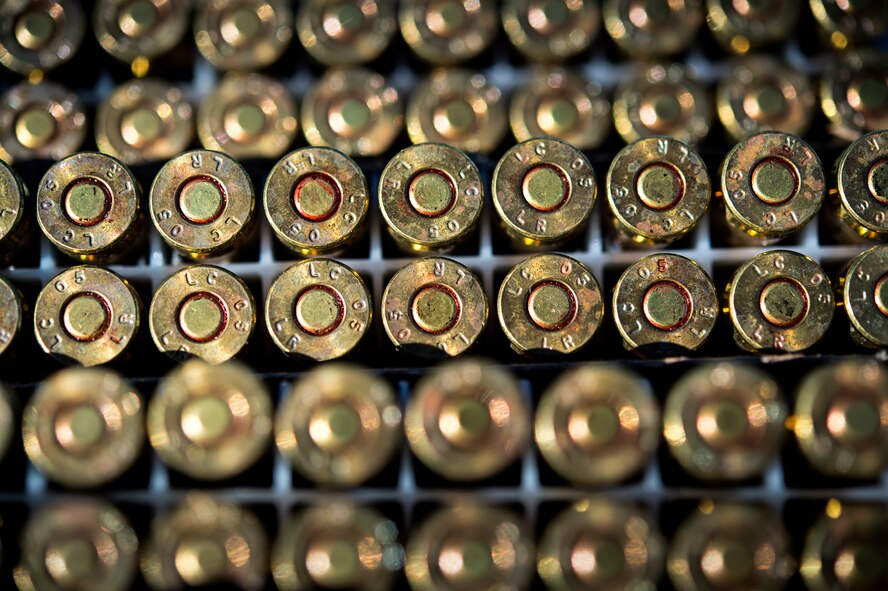 Ammunition rounds rest in a row during exercise GLOBAL EAGLE, Oct. 30, 2015, at Avon Park Air Force Range, Fla. The 820th Base Defense Group uses 7.62mm rounds in the M24 Sniper Weapons System for close precision engagement. (U.S. Air Force photo by Senior Airman Ryan Callaghan/Released)

