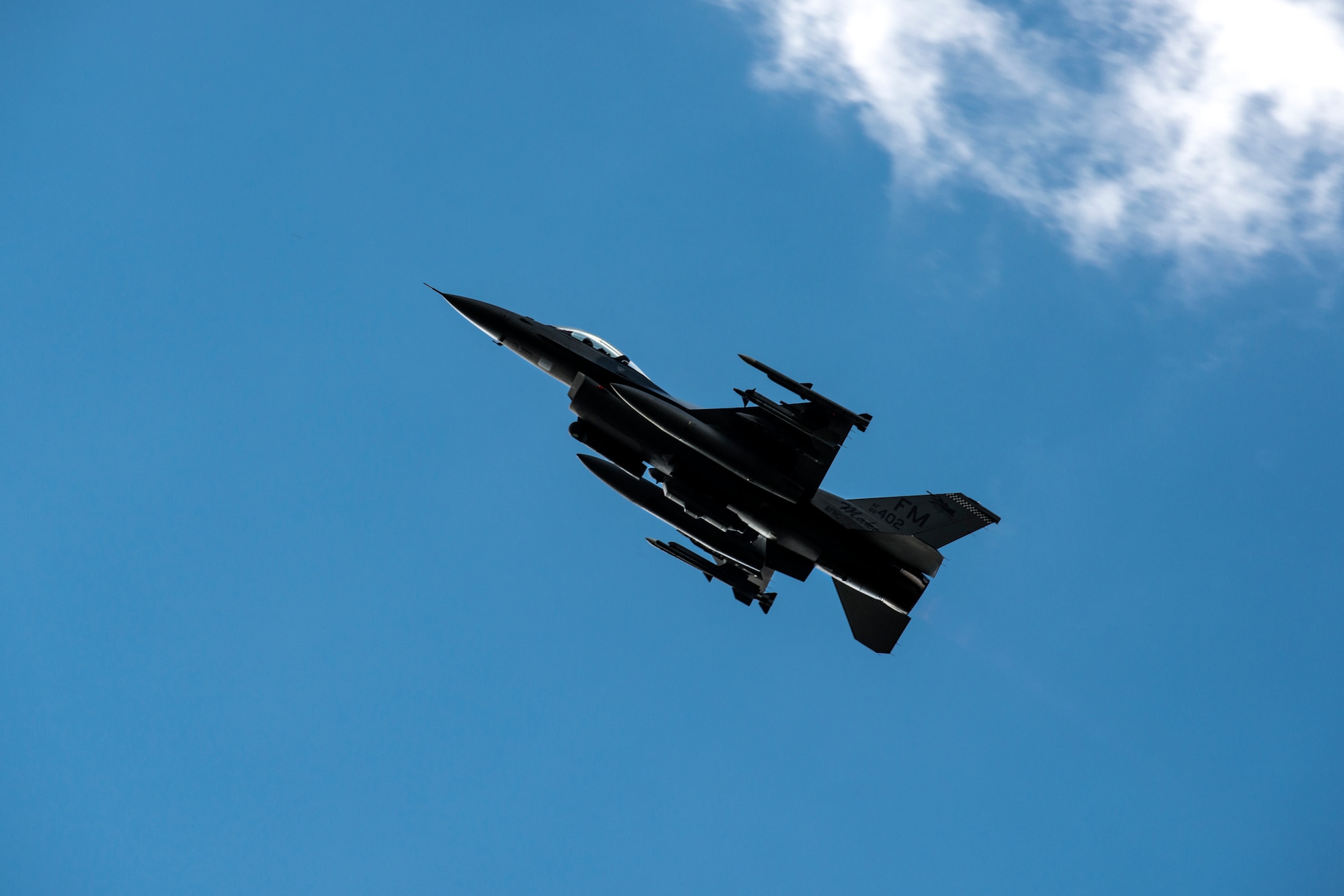 An F-16C Fighting Falcon from the 482nd Fighter Wing at Homestead Air Reserve Base, Fla. performs a show of force maneuver, Oct. 29, 2015, at Avon Park Air Force Range, Fla. F-16C’s were on station to assist in training objectives for the 93d Air Ground Operations Wing and exercise GLOBAL EAGLE. (U.S. Air Force photo by Senior Airman Ryan Callaghan/Released)
