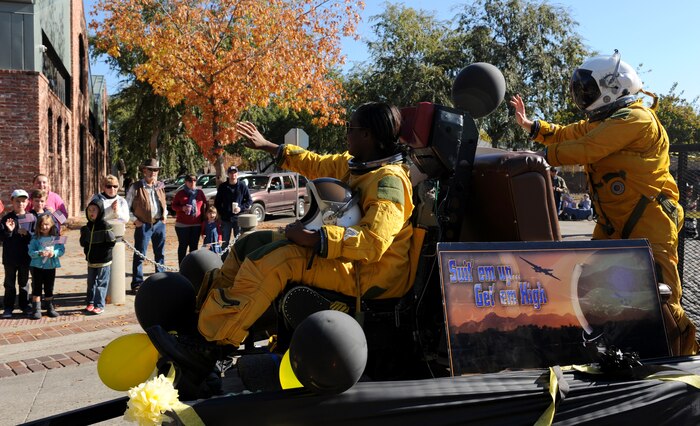 Members of the 9th Physiological Support Squadron from Beale Air Force Base, participate in the Yuba/Sutter Veterans Day Parade in Marysville, California, Nov. 11, 2015. Veterans Day is celebrated throughout the U.S. to honor those who have served and are serving in the Armed Forces. (U.S. Air Force photo by Staff Sgt. Robert M. Trujillo)
