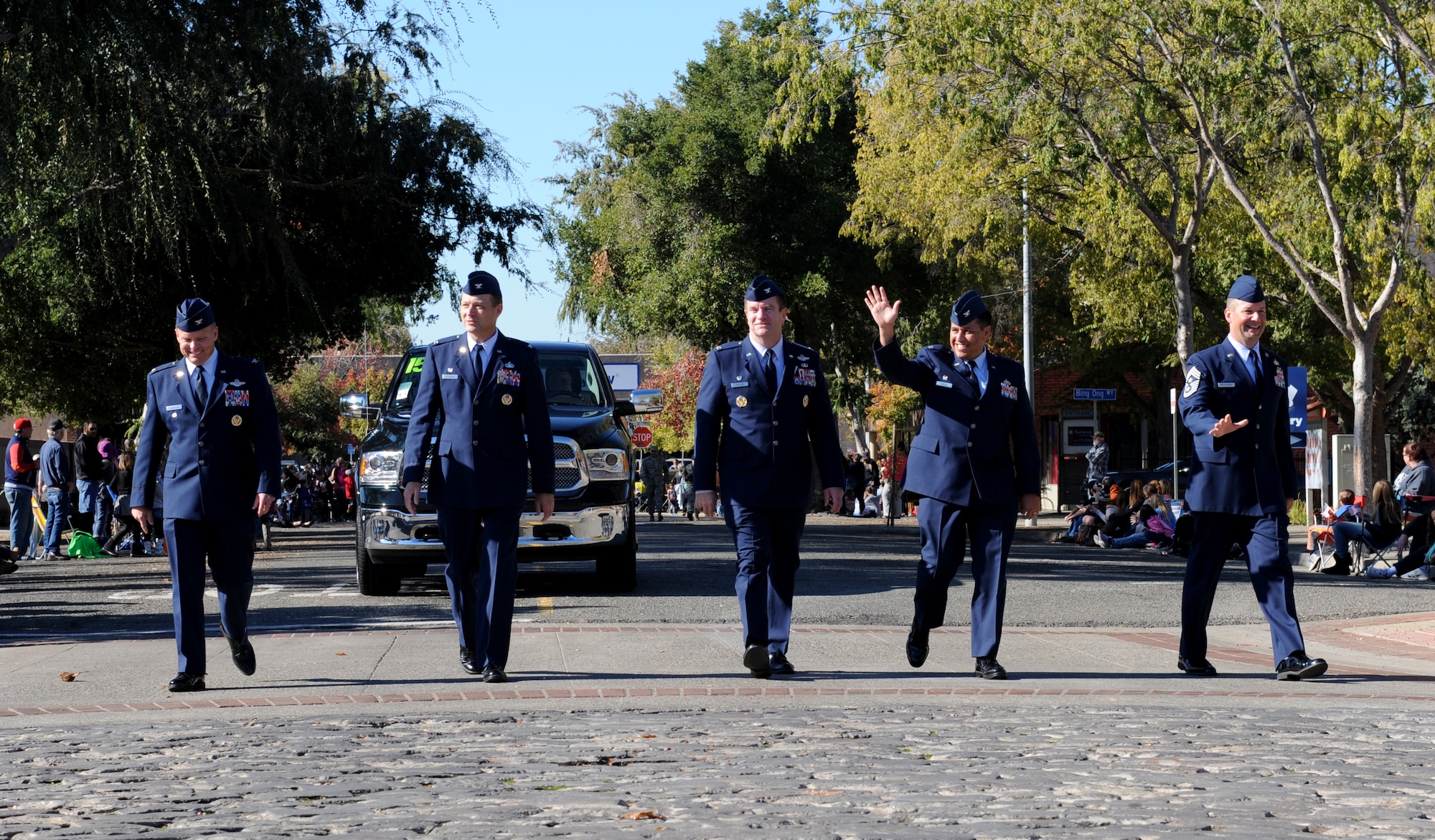 Members of the Blackbird Maintainers Group march during the Yuba/Sutter Veterans Day Parade in Marysville, California, Nov. 11, 2015. The SR-71 Blackbird called Beale Air Force Base home from 1966 to 1990. (U.S. Air Force photo by Staff Sgt. Robert M. Trujillo/Released)