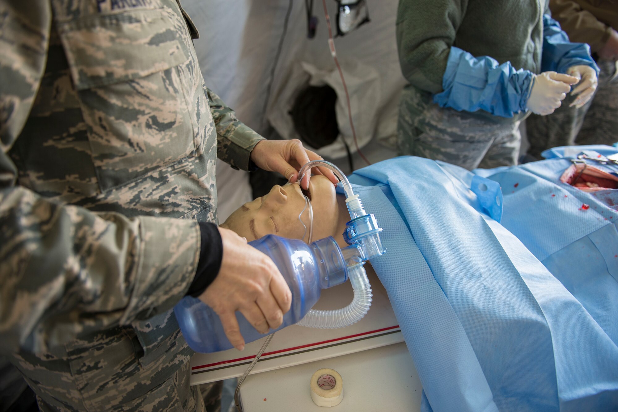 Maj. Cynthia Parent, 141st Medical Group nurse anesthetist, simulates manual ventilation on a manikin during Gunfighter Flag 16-1 at Mountain Home Air Force Base, Idaho, Nov. 5, 2015. Parent is part of an Air National Guard unit out of Spokane, Washington. (U.S. Air Force photo by Airman 1st Class Jessica H. Evans/RELEASED)