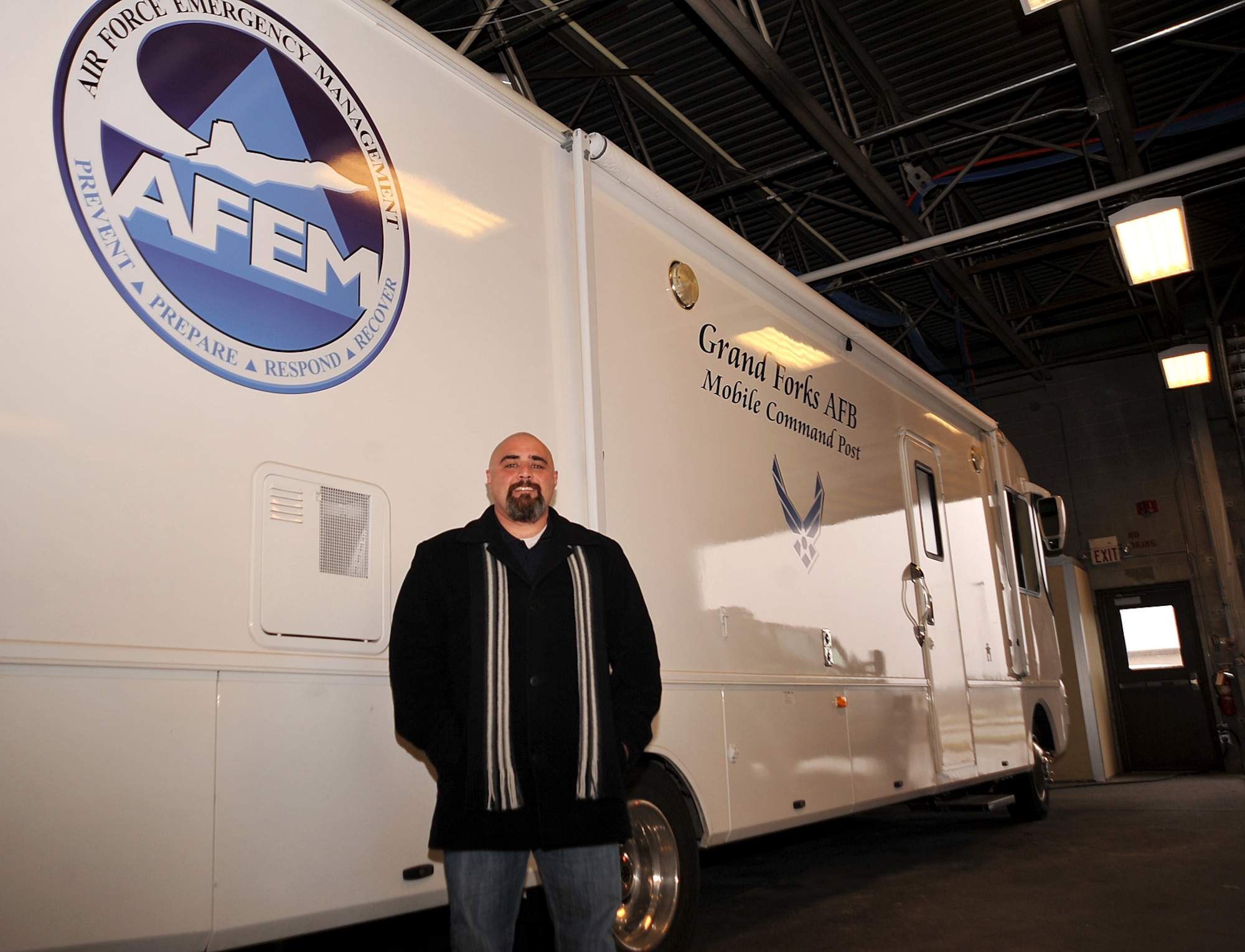 Shawn Leach, 319th Civil Engineer Squadron emergency management specialist, is in charge of ensuring the emergency management program runs smoothly and that all base members are prepared for any hazards on Grand Forks Air Force Base, North Dakota, Nov. 12, 2015. Leach was named Warrior of the Week for the second week in November. (U.S. Air Force photo/Airman 1st Class Bonnie Grantham/Released)