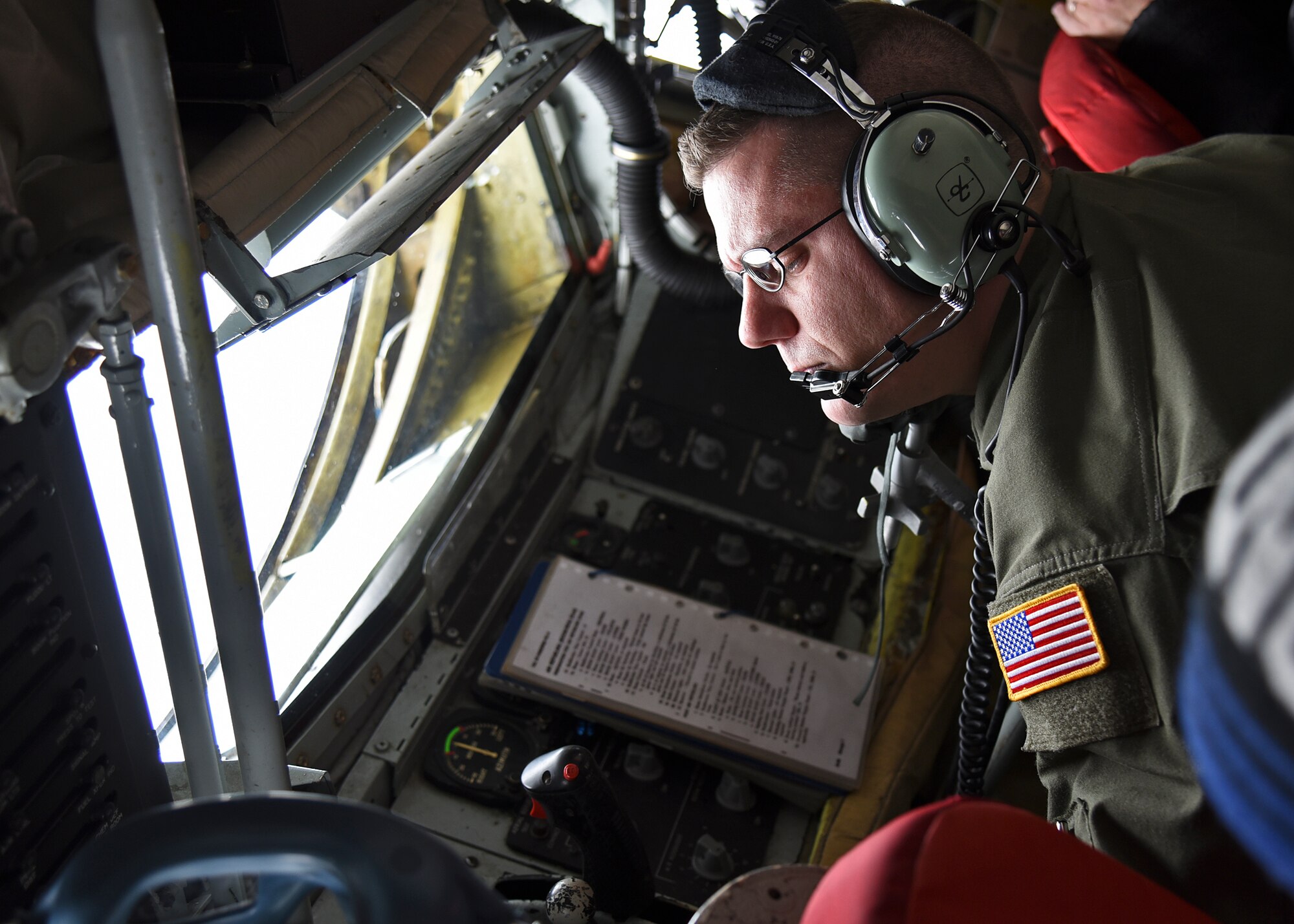 Staff Sgt. Gregory Albers, 93rd Air Refueling Squadron boom operator, prepares to refuel a C-17 Globemaster from Joint-Base Lewis McChord, Wash., during an orientation flight Nov. 12, 2015, at Fairchild AFB, Wash. Albers was part of a five-person crew that helped assist, teach and show the Fairchild mission to Spokane-area civic leaders.
(U.S. Air Force photo/Airman 1st Class Mackenzie Richardson)

