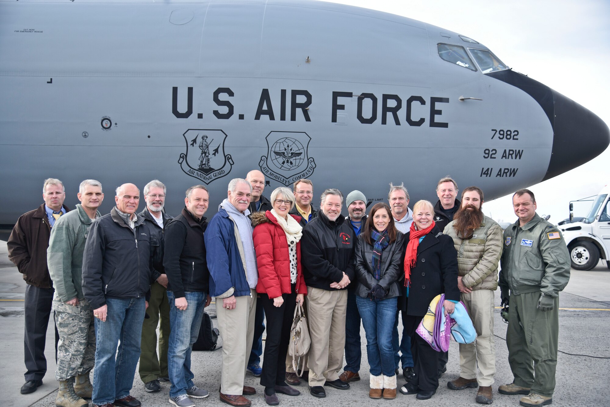 Col. Brian McDaniel, 92nd Air Refueling Wing commander, and Chief Master
Sgt. Christian Pugh, 92nd ARW command chief, pose with honorary commanders
before an orientation flight Nov. 12, 2015 at Fairchild Air Force Base,
Wash. The orientation flight gave Spokane-area civic leaders an opportunity
to witness the mission firsthand. (U.S. Air Force photo-Airman 1st Class
Taylor Bourgeous) 
