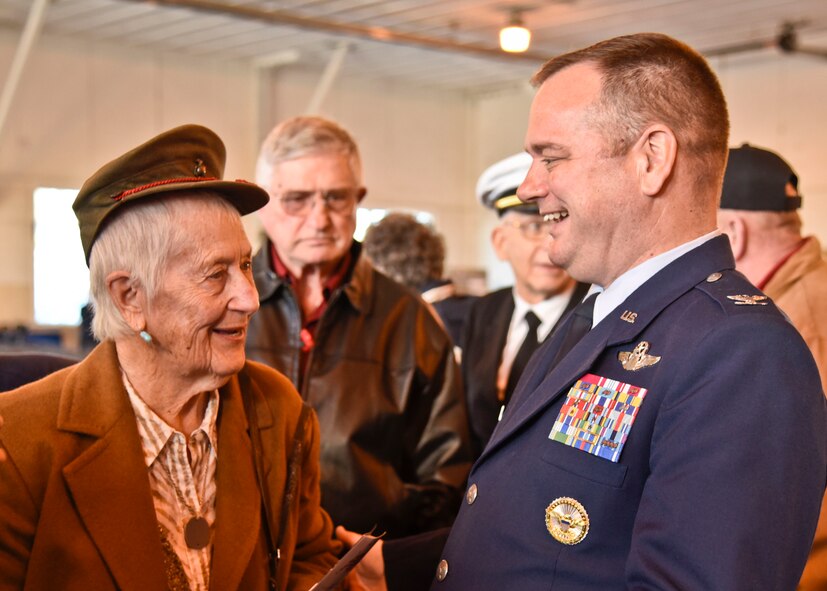 Col. Brian McDaniel, 92nd Air Refueling Wing commander, speaks to Devonia Grashio during a Veterans Day ceremony, Nov. 11, 2015, at Felts Field in Spokane, Wash. Grashino’s husband, U.S. Air Force Col. Sam Grashio, survived the Bataan Death March and escaped from a prisoner of war camp in the Philippines. He is survived by his wife Devonia and his son Sam. (U.S. Air Force photo-Airman 1st Class Taylor Bourgeous)