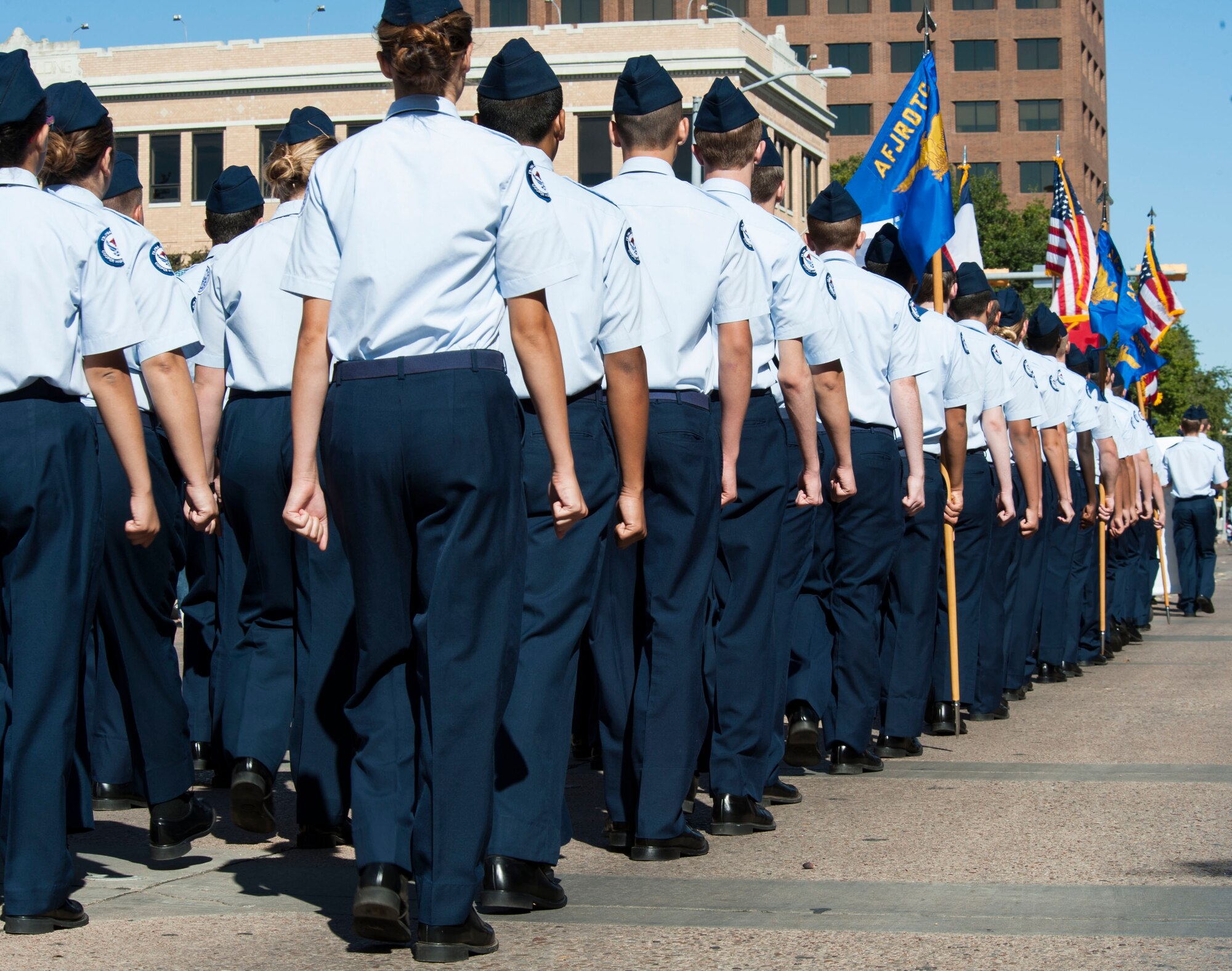 Local Junior Reserve Officers’ Training Corps cadets march in formation at the Veteran’s Day Parade Nov. 7, 2015 in downtown Abilene, Texas. In addition to military personnel, members from local high school JROTC programs were invited to participate in the parade. (U.S. Air Force Photo by Airman 1st Class Katherine Miller/Released)