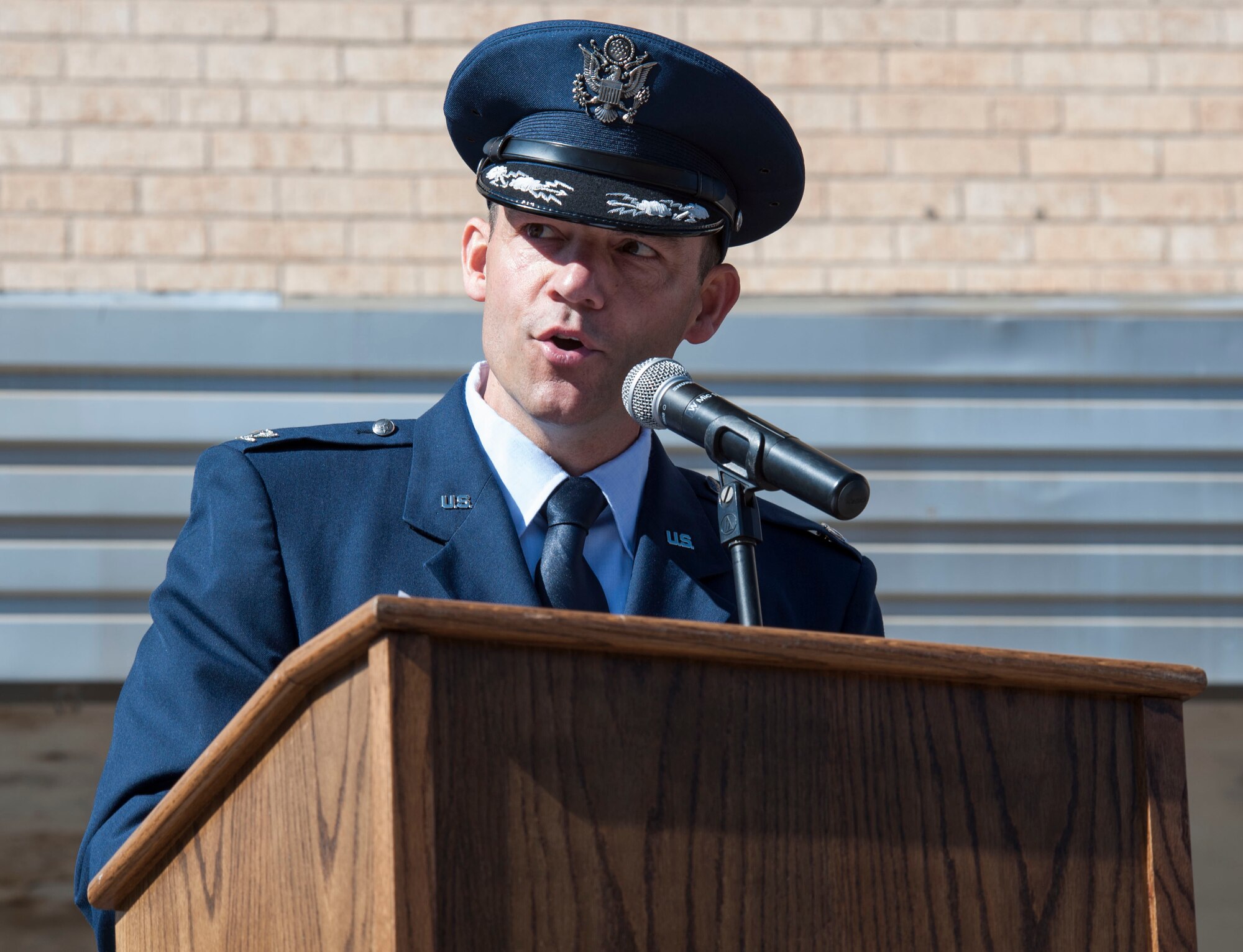 U.S. Air Force Col. David M. Benson, 7th Bomb Wing commander speaks to the crowd at the Veterans Day Parade Nov. 7, 2015, in downtown Abilene, Texas. Benson thanked current and past military members for their service and dedication to our country, as well as the Abilene community for their continued support to Dyess Air Force Base. (U.S. Air Force Photo by Airman 1st Class Katherine Miller/Released)