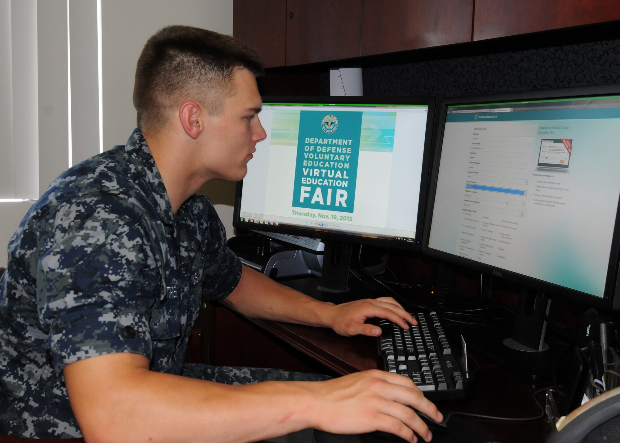 Information Systems Technician Seaman Austin Tresner explores how to register online for the DOD Virtual Education Fair, scheduled for Nov. 19. The fair offers service members the opportunity to chat live with more than 40 college admission representatives and to connect with education counselors. The virtual education fair is in support of all of the services' voluntary education programs. (U.S. Navy photo/Carla M. McCarthy)
