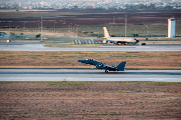 A U.S. Air Force F-15E Strike Eagle lands on the runway Nov. 12, 2015, at Incirlik Air Base, Turkey. Six F-15Es from the 48th Fighter Wing based at RAF Lakenheath, UK, deployed to Incirlik AB in support of Operation Inherent Resolve. These aircraft are designed to perform air-to-air and air-to-ground missions in all weather conditions. (U.S. Air Force photo by Staff Sgt. Jack Sanders/Released) 