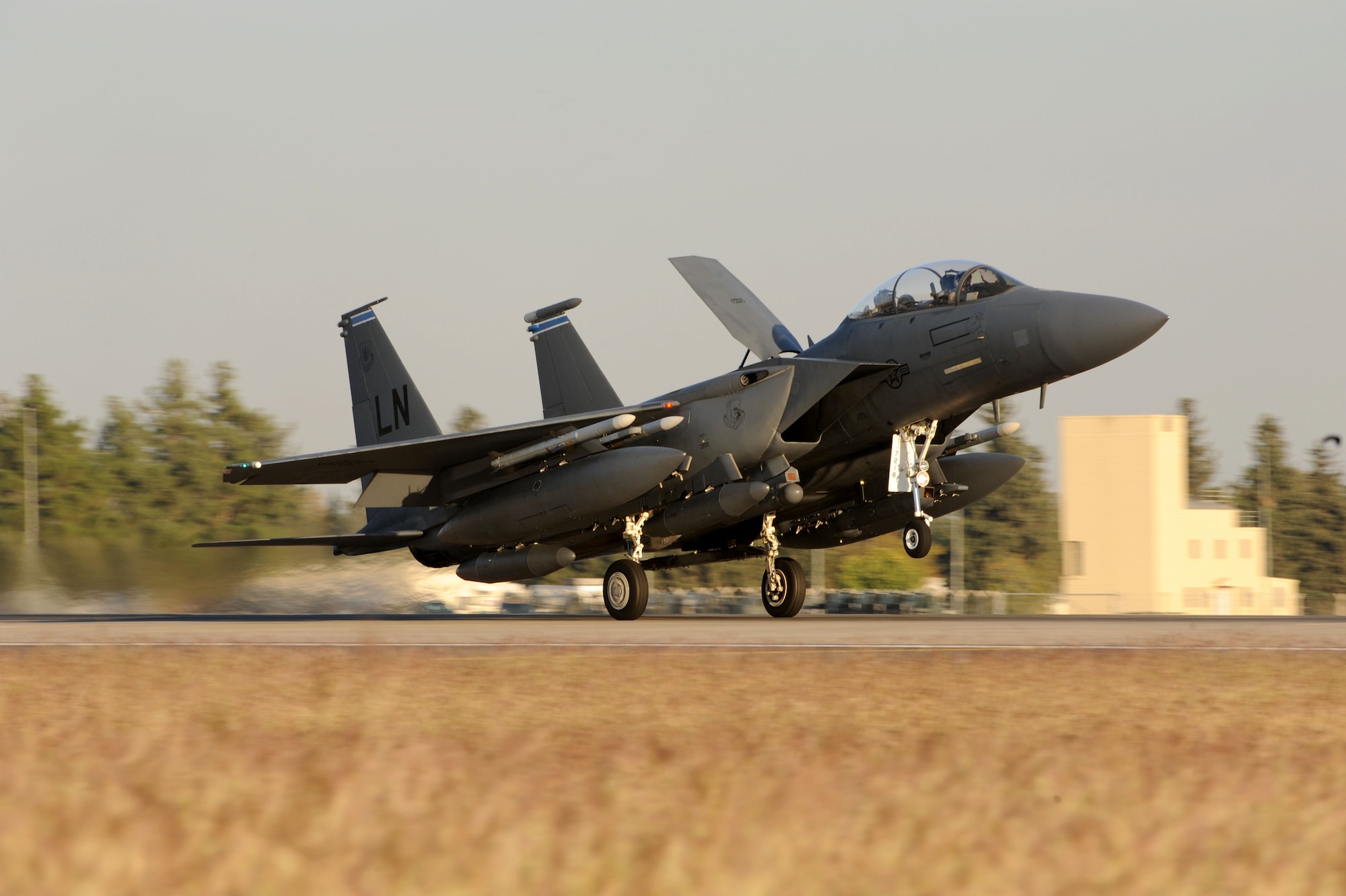 A U.S. Air Force F-15E Strike Eagle lands on the runway Nov. 12, 2015, at Incirlik Air Base, Turkey. Six F-15Es from the 48th Fighter Wing based at RAF Lakenheath, UK, are deployed to Incirlik AB as a part of Operation Inherent Resolve.These aircraft are designed to perform air-to-air and air-to-ground missions in all weather conditions. (U.S. Air Force photo by Tech. Sgt. Taylor Worley) 