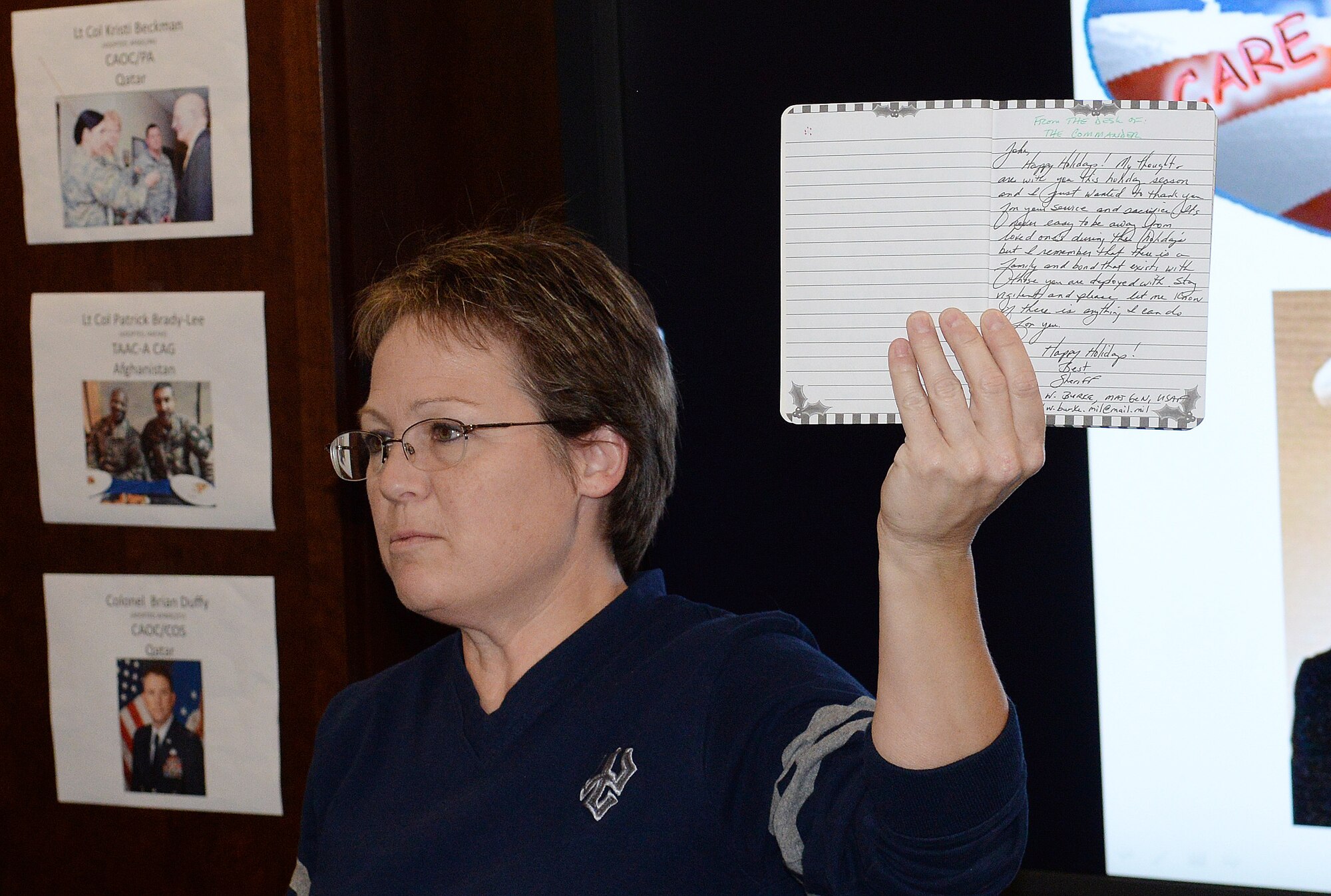 Ms. Annette Bonero, AFDW’s Unit Deployment Manager describes the items that will be shipped to the deployed members. AFDW volunteers packaged 25 care packages for deployed members November 12, 2015 on Joint Base Andrews, Md. The packages were filled with snacks and decorations to celebrate the holidays away from home. Since 2009, AFDW has sent 341 care packages to service members around the globe. (U.S. Air Force photo/Mr. Jim Lotz)