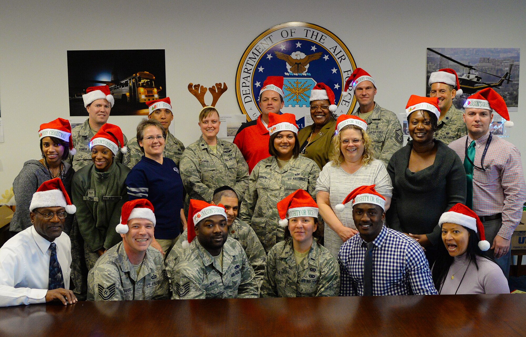 Air Force District of Washington volunteers packaged 25 care packages for AFDW deployed members November 12, 2015 on Joint Base Andrews, Md. The packages were filled with snacks and decorations to celebrate the holidays away from home. Since 2009, AFDW has sent 341 care packages to service members around the globe. (U.S. Air Force photo/Mr. Jim Lotz)