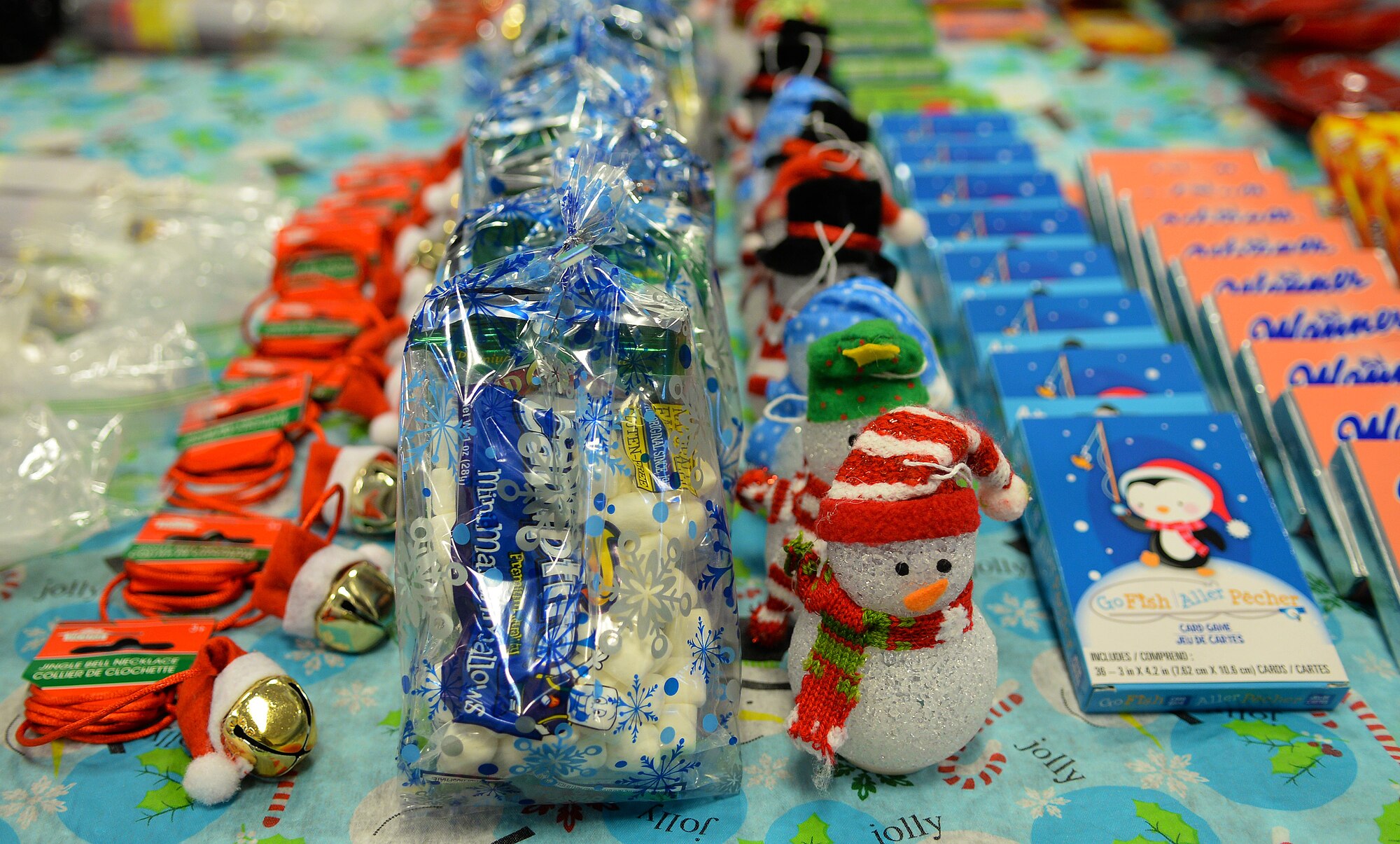 Air Force District of Washington volunteers packaged 25 care packages for AFDW deployed members November 12, 2015 on Joint Base Andrews, Md. The packages were filled with snacks and decorations to celebrate the holidays away from home. Since 2009, AFDW has sent 341 care packages to service members around the globe. (U.S. Air Force photo/Mr. Jim Lotz)