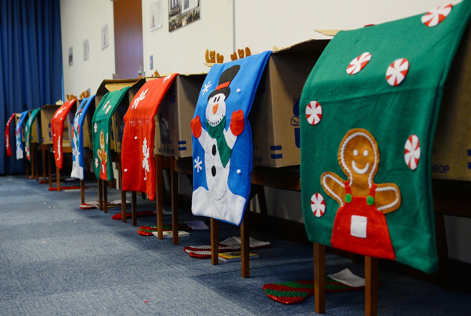 Air Force District of Washington volunteers packaged 25 care packages for AFDW deployed members November 12, 2015 on Joint Base Andrews, Md. The packages were filled with snacks and decorations to celebrate the holidays away from home. Since 2009, AFDW has sent 341 care packages to service members around the globe. (U.S. Air Force photo/Mr. Jim Lotz)