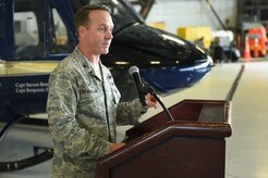 Col. Brad Hoagland, Joint Base Andrews/11th Wing commander, speaks to an audience during a ground breaking ceremony for the 811 Operations Group at Joint Base Andrews, Md., Nov. 12, 2015. The new facility will provide space for mission planning, briefing, training, flight simulation, operations and administration. (U.S. Air Force photo by Senior Airman Joshua R. M. Dewberry/Released)