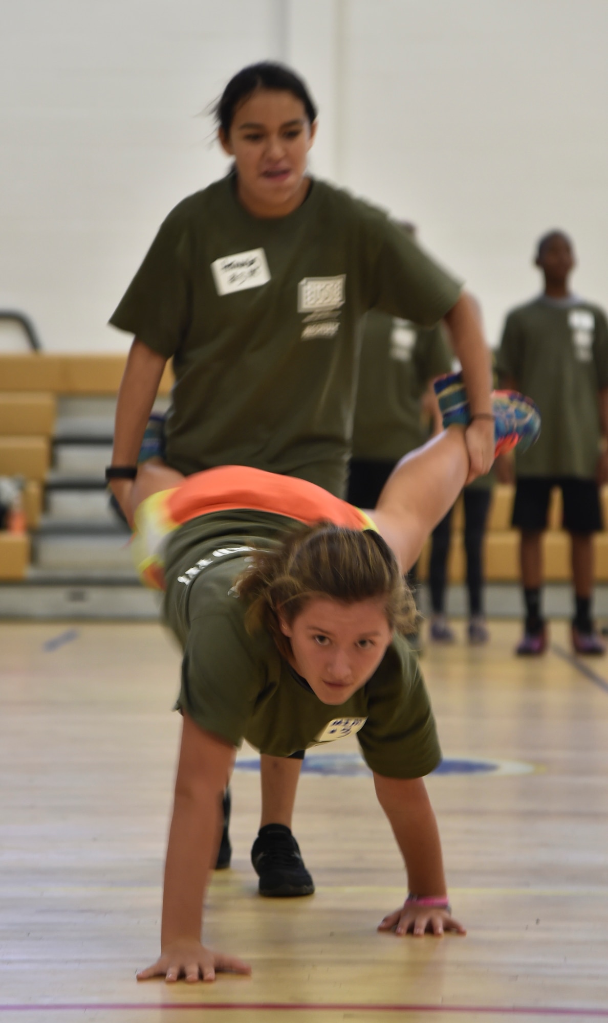Azlynn Mims  and Adrian Hernandez, military children, race other kids during Operation Basic Boot Camp on Joint Base Andrews, Nov. 7, 2015. The event included physical training, a mock military in-processing station, basic drills and military knowledge classes, a survival class and capture the flag to help military children better understand and appreciate parental military service. (U.S. Air Force photo/ Airman 1st Class J.D. Maidens/ Released)
