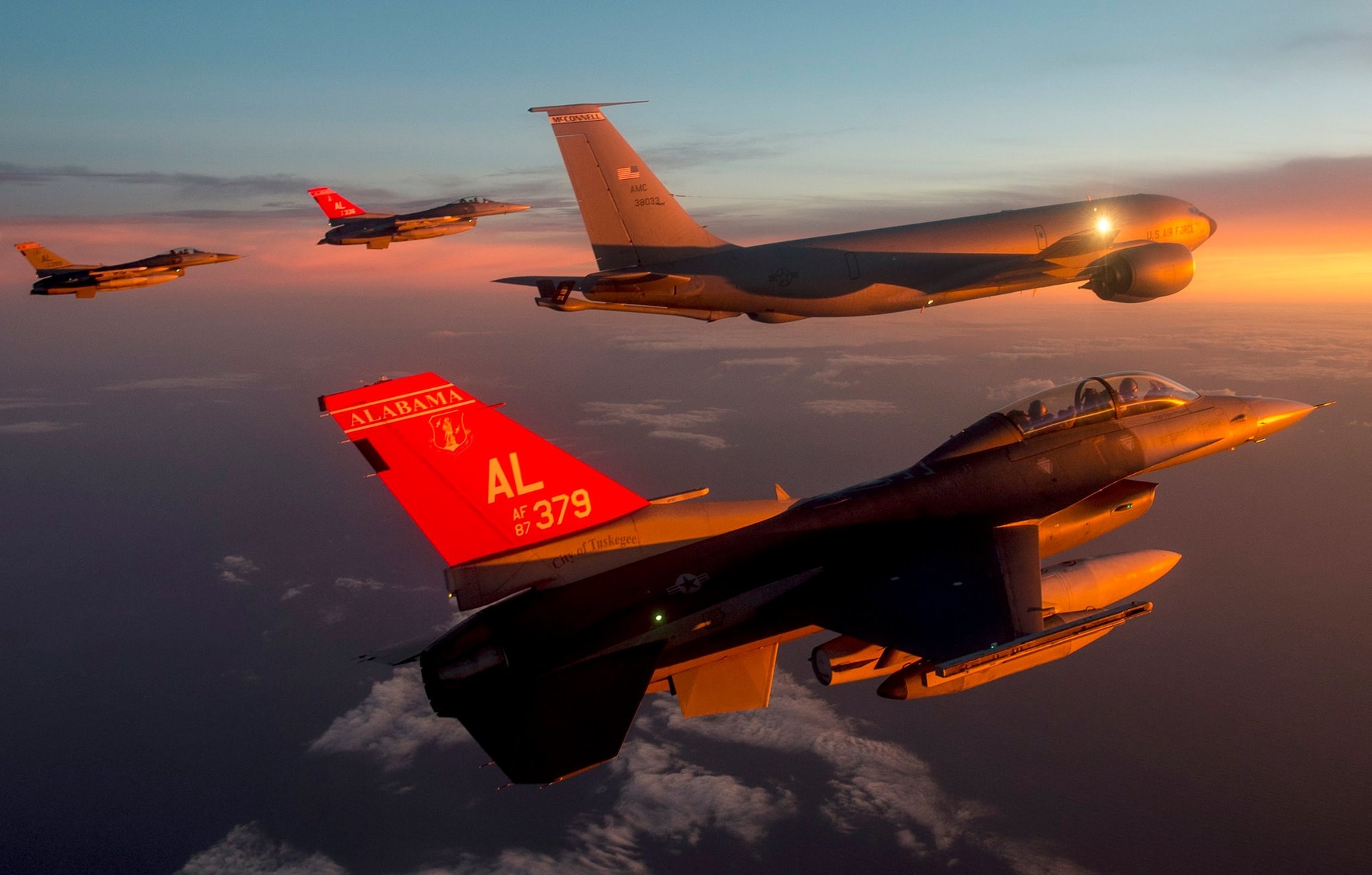 Alabama Air National Guard F-16 Fighting Falcons descend into Campia Turzii, Romania, Oct. 13, 2015, after flying from Montgomery, Alabama. Four F-16 Fighting Falcons and approximately 150 Airmen from the 187th Fighter Wing, Alabama Air National Guard participated in Dacian Viper, a training deployment to Romania designed to increase readiness to conduct combined air operations and to meet future security challenges. (U.S. Air Force photo by Staff Sgt. Matthew Bruch/Released)
