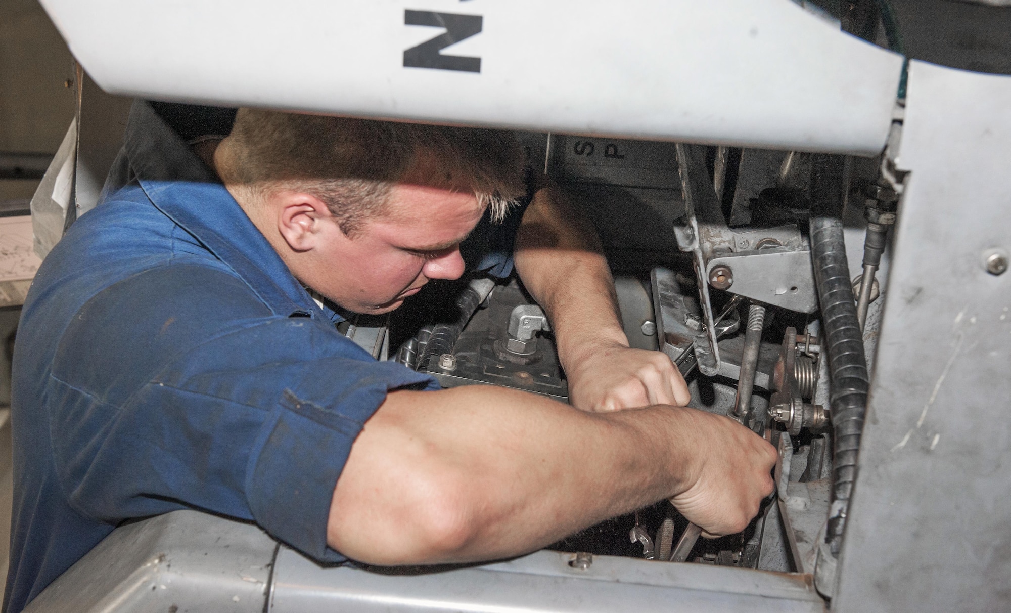 Senior Airman Nicholas Appenzeller, 8th Maintenance Squadron aerospace ground equipment journeyman, performs maintenance on a bomb lift at Kunsan Air Base, Republic of Korea, Nov. 10, 2015. The AGE flight maintains more than 600 pieces of equipment across the base valued at $15 million. (U.S. Air Force photo by Staff Sgt. Nick Wilson/Released) 
