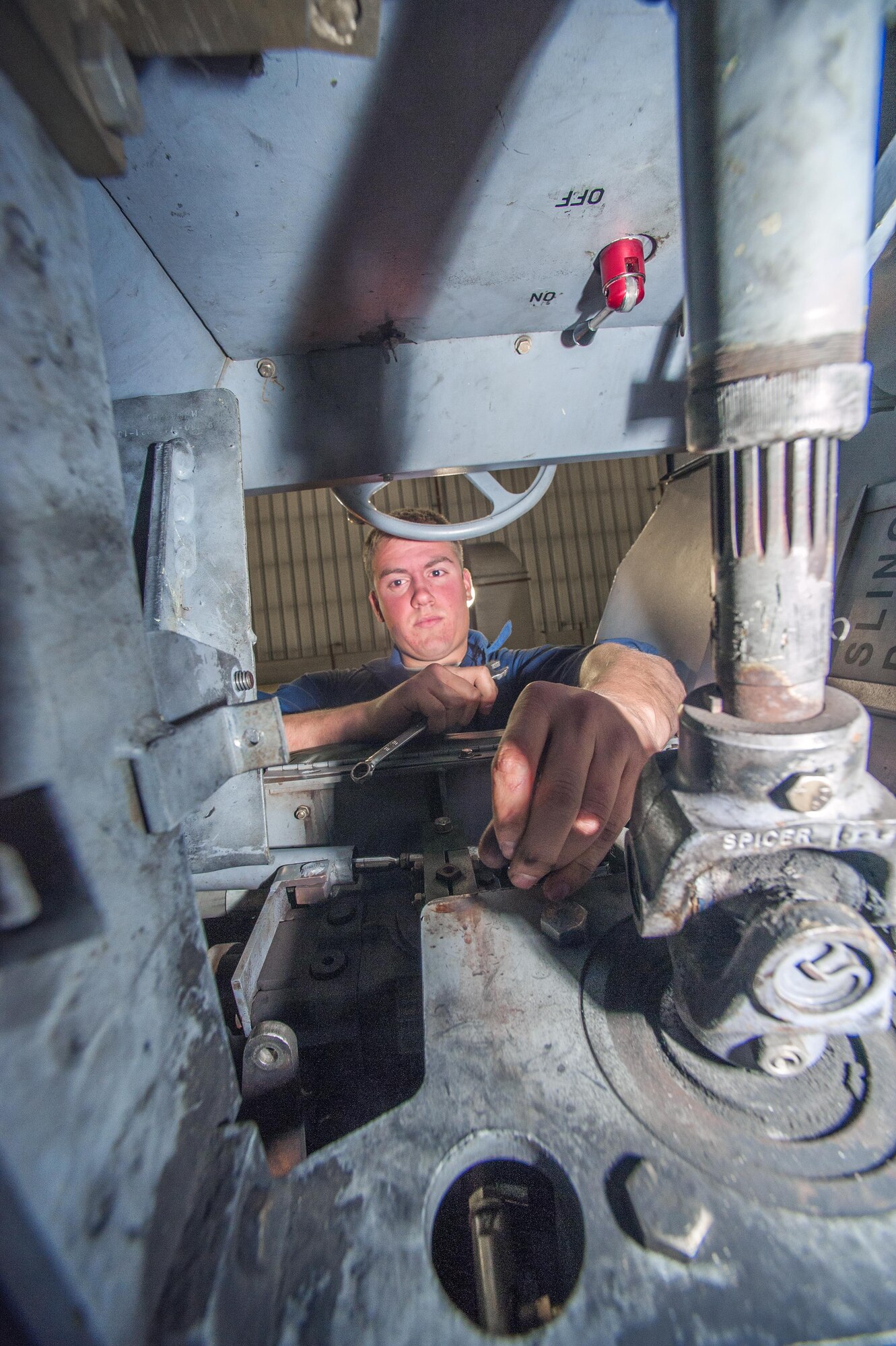 Senior Airman Nicholas Appenzeller, 8th Maintenance Squadron aerospace ground equipment journeyman, performs maintenance on a bomb lift at Kunsan Air Base, Republic of Korea, Nov. 10, 2015. The AGE flight maintains more than 600 pieces of equipment across the base valued at $15 million. (U.S. Air Force photo by Staff Sgt. Nick Wilson/Released) 
