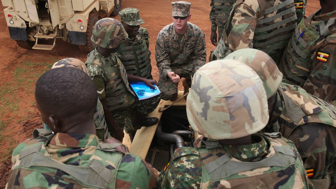U.S. Marines with Special-Purpose Marine Air-Ground Task Force Crisis Response-Africa, train members of the Uganda People’s Defense Force on Mine-Resistant, Ambushed-Protected Vehicles, or MRAPs, at Camp Singo, Uganda, Nov. 3, 2015. Marines and sailors with SPMAGTF-CR-AF are training with the UPDF to increase engineering and logistical capabilities while strengthening the bonds between the partner countries. 