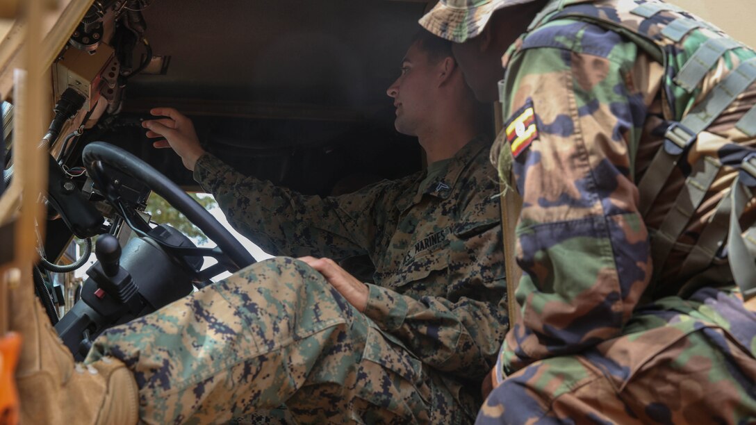 U.S. Marines with Special-Purpose Marine Air-Ground Task Force Crisis Response-Africa, train members of the Uganda People’s Defense Force on Mine-Resistant, Ambushed-Protected Vehicles, or MRAPs, at Camp Singo, Uganda, Nov. 3, 2015. Marines and sailors with SPMAGTF-CR-AF are training with the UPDF to increase engineering and logistical capabilities while strengthening the bonds between the partner countries. 