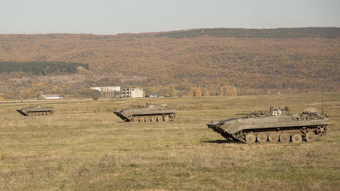 Bulgarian BMP-1s, U.S. M1A1 Abrams tanks and light-armored reconnaissance vehicles bound together toward an objective during the final exercise of Platinum Lion 16-1 at Novo Selo Training Area, Bulgaria, Nov. 7, 2015. Platinum Lion, the first multinational live-fire engagement in which the Combined Arms Company participated, is a NATO-led exercise designed to increase readiness and build partner capacity through realistic combat scenarios and objective-focused training. 