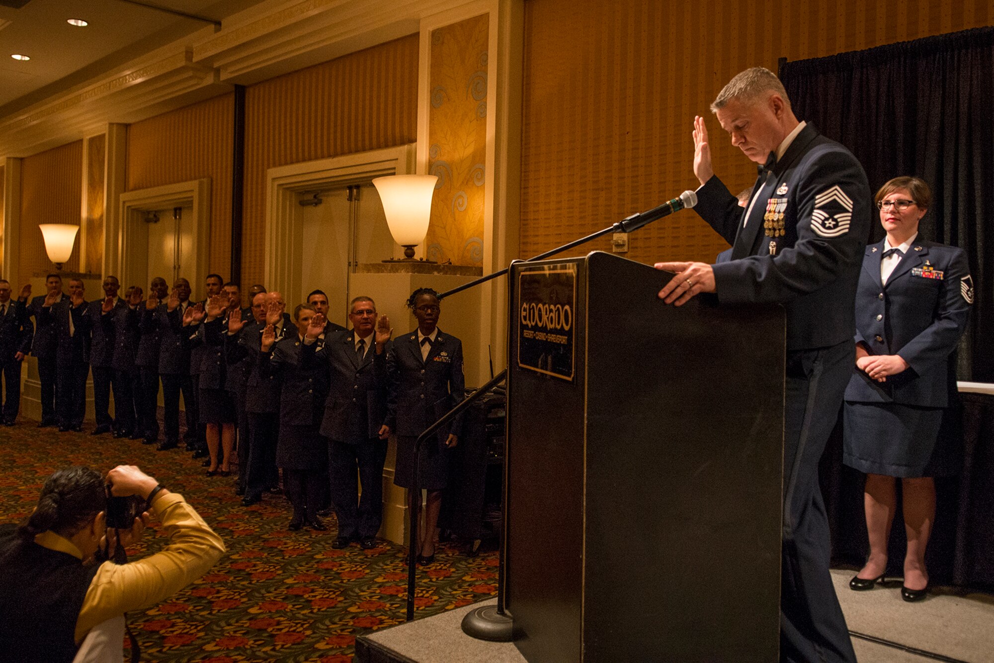 U.S. Air Force Chief Master Sgt. Steven Vogle leads a group of newly promoted Master Sergeants through the Senior Noncommissioned Officer Oath of Induction on Nov. 7, 2015, Shreveport, La. The 307th Bomb Wing Senior Noncommissioned Officer Induction Ceremony is an annual event held to recognize Airmen who were recently promoted to the rank of Master Sergeant. (U.S. Air Force photo by Master Sgt. Greg Steele/Released)