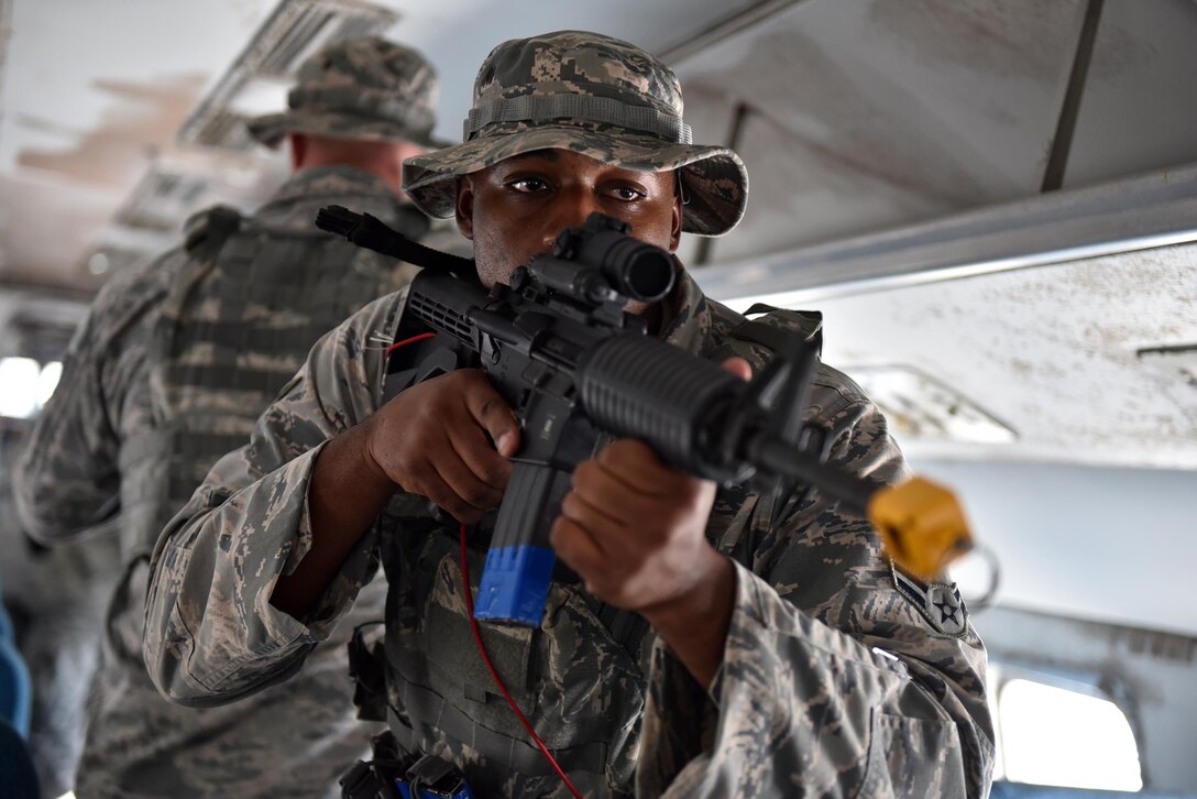 Air Force Tech. Sgt. James Heathcock and Airman 1st Class Jeremy Cooper secure the interior of an aircraft during anti-hijacking training as part of Southern Strike 16 at the Combat Readiness Training Center in Gulfport, Miss., Nov. 5, 2015. Heathcock and Cooper are assigned to the New York Air National Guard’s 186th Security Forces Squadron. New York Air National Guard photo by Staff Sgt. Christopher S. Muncy