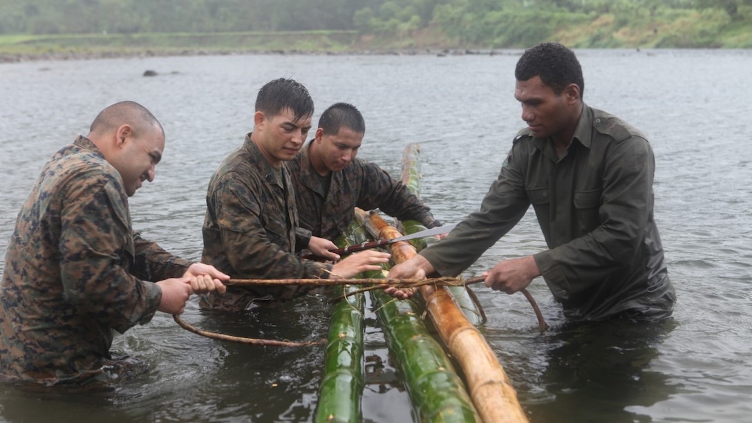 Marines learn how to build a raft made out of bamboo during a training exercise in Namosi Province, Fiji, Oct. 14. Marines trained with members of the Republic of Fiji Military Force. 