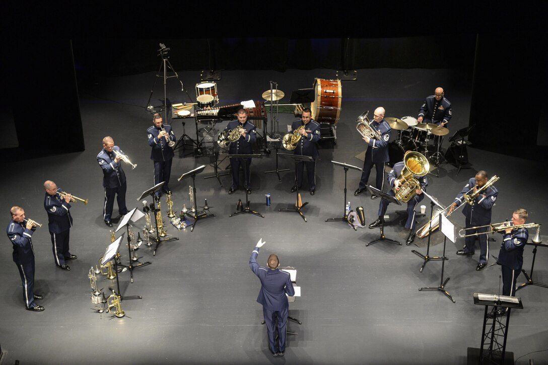 Members of the U.S. Air Force Heritage of America Band’s Heritage Brass ensemble play a set at the Paramount Theater in Goldsboro, N.C., Nov. 5, 2015. Each year, the band’s ensembles perform more than 300 concerts along the East Coast. U.S. Air Force photo by Airman 1st Class Ashley Williamson