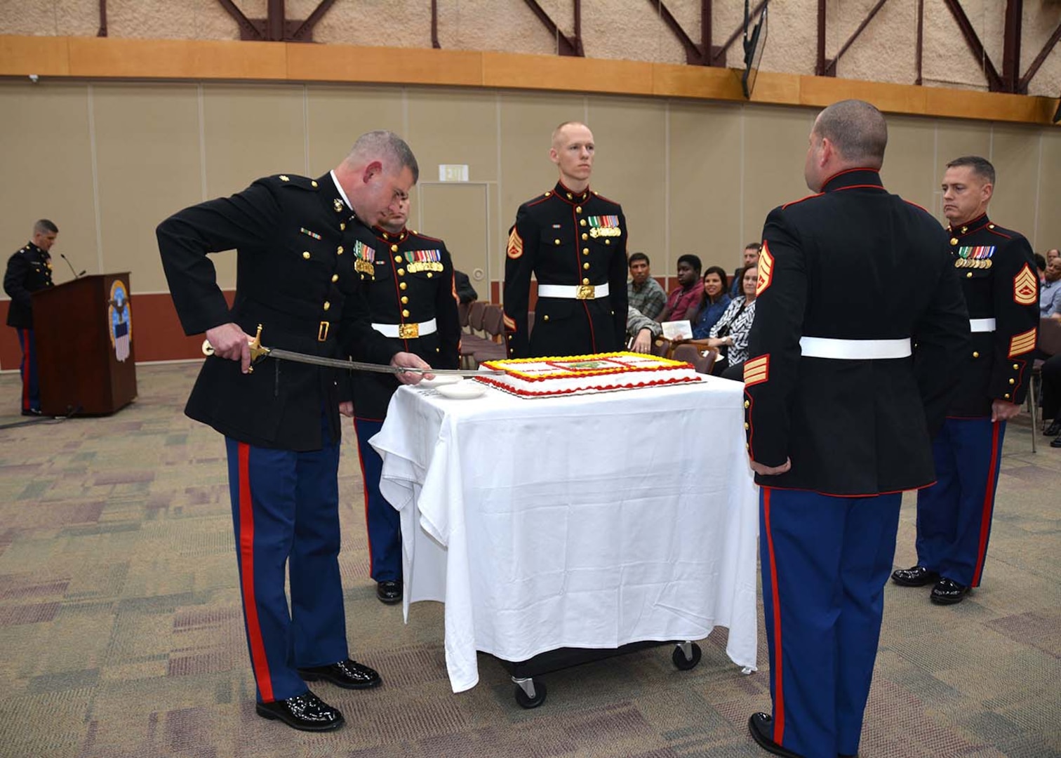 Marine Corps Maj. Chris Story cuts the first slice of cake Nov. 10. 2015 during Defense Logistics Agency Aviation’s ceremony celebrating the 240th birthday of the U.S. Marine Corps in the Frank B. Lotts Conference Center on Defense Supply Center Richmond, Virginia.  