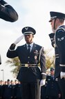 Airmen from the Vance Honor Guard Silver Talon, Senior Airman Chelan Carr (center) and Senior Airman Chase Kelley (right), salute during the playing of the national anthem at a Veterans Day retreat ceremony Nov. 13, 2015 at Vance Air Force Base, Oklahoma. More than 100 Airmen gathered to give honor to those who have served in the U.S. Armed Forces. (U.S. Air Force photo / Staff Sgt. Nancy Falcon)