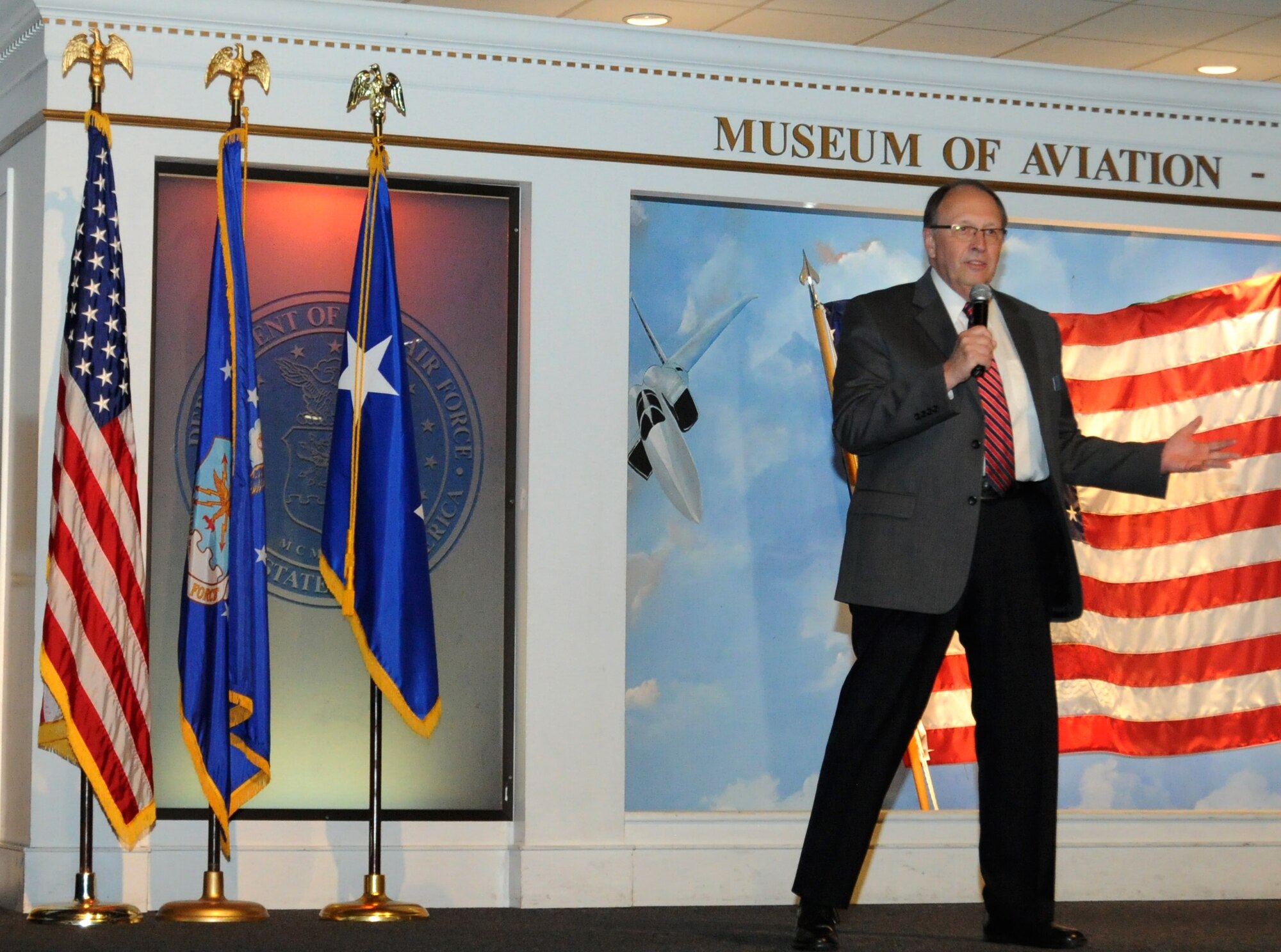 Retired Lt. Gen. Charles Stenner, former Air Force Reserve Command commander, talks to an audience about the importance of STARBASE Robins Nov. 6, 2015 at the Museum of Aviation, Robins Air Force Base, Georgia. STARBASE Robins is a premier Department of Defense educational program sponsored by AFRC. (U.S. Air Force photo by Staff Sgt. Sarah Hanson/RELEASED)