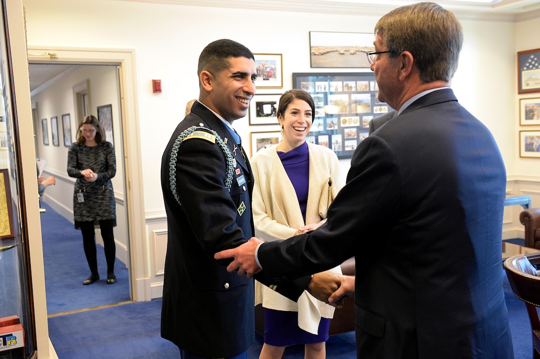 Defense Secretary Ash Carter greets Medal of Honor recipient, retired Army Capt. Florent A. Groberg, in his office before the Hall of Heroes induction ceremony at the Pentagon, Nov. 13, 2015. A day earlier, President Barack Obama presented the Medal of Honor to Groberg at the White House for courageous actions in Afghanistan. DoD photo by U.S. Army Sgt. 1st Class Clydell Kinchen 