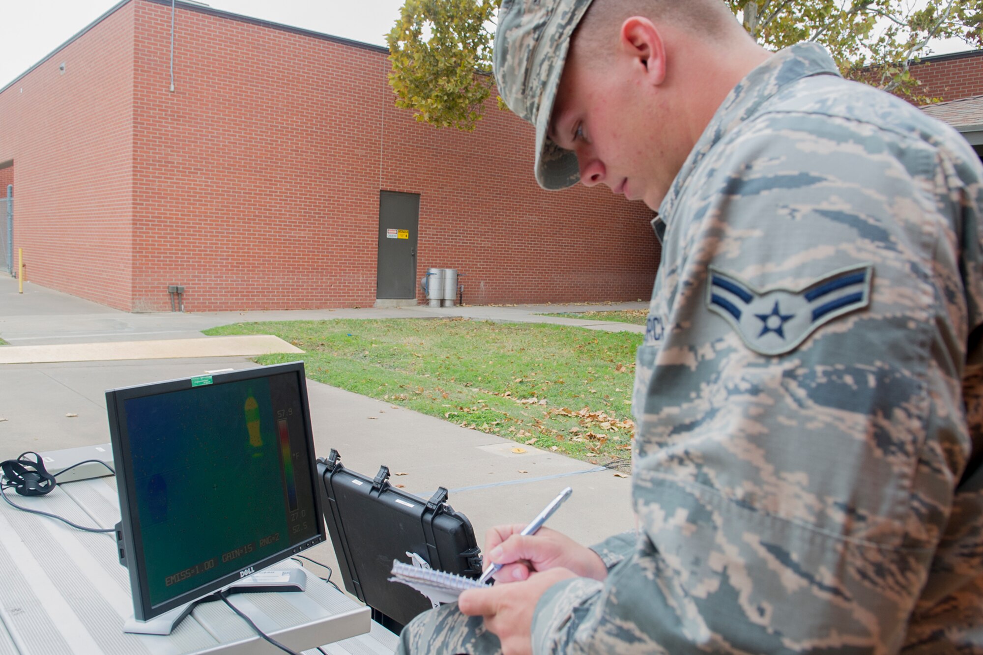 Airman 1st Class Aaron B. Elmore, 312th Training Squadron Special Instruments Training student, catalogs observations during a collection exercise at Goodfellow Air Force Base, Texas, Nov. 10, 2015. The students of Class 16-001 collaborated to complete the exercise. (U.S. Air Force photo by Staff Sgt. Laura R. McFarlane/Released)