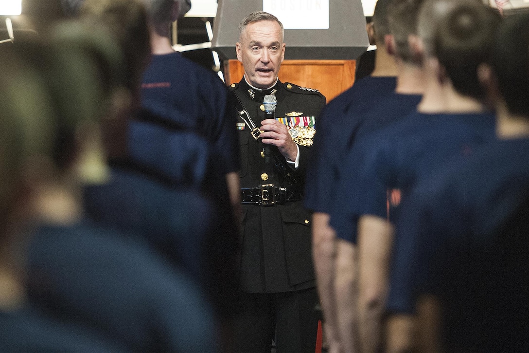 Marine Corps Gen. Joseph F. Dunford Jr., chairman of the Joint Chiefs of Staff, administers the oath of enlistment to 20 Marine Corps recruits at the Boston Semper Fidelis Society Birthday Luncheon in Boston, Nov. 13, 2015. DoD photo by Navy Petty Officer 2nd Class Dominique A. Pineiro