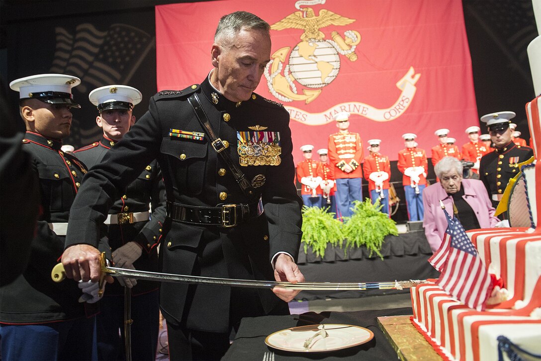 Marine Corps Gen. Joseph F. Dunford Jr., chairman of the Joint Chiefs of Staff, cuts a cake commemorating the Marine Corps' birthday at the Boston Semper Fidelis Society Birthday Luncheon in Boston, Nov. 13, 2015. DoD photo by Navy Petty Officer 2nd Class Dominique A. Pineiro